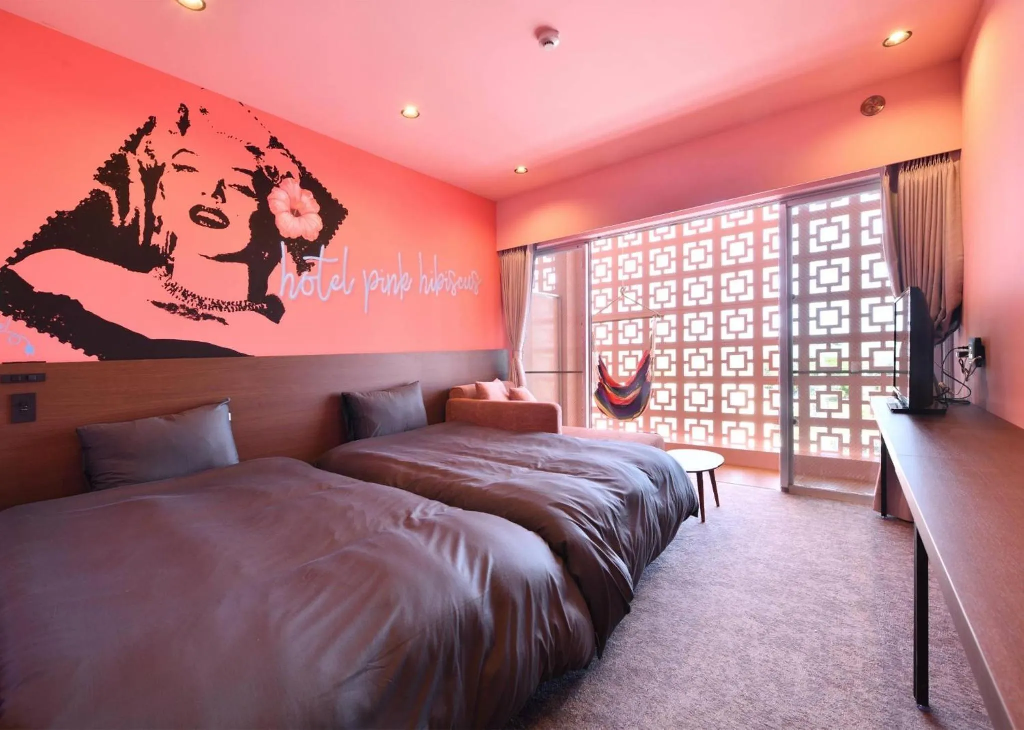 Bed in HOTEL PINK HIBISCUS