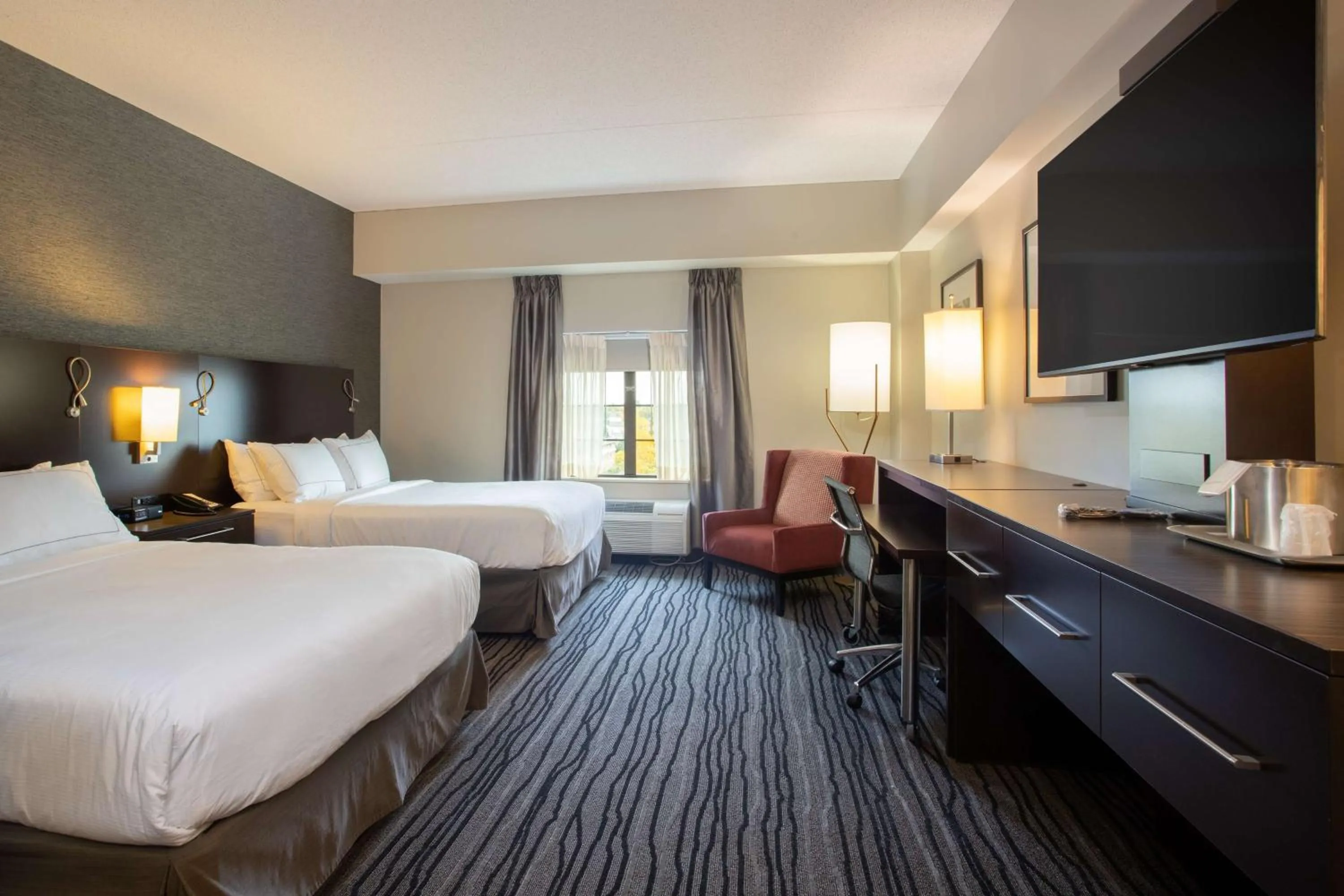 Bed in The Mosey Buffalo Williamsville Tapestry Collection Hilton