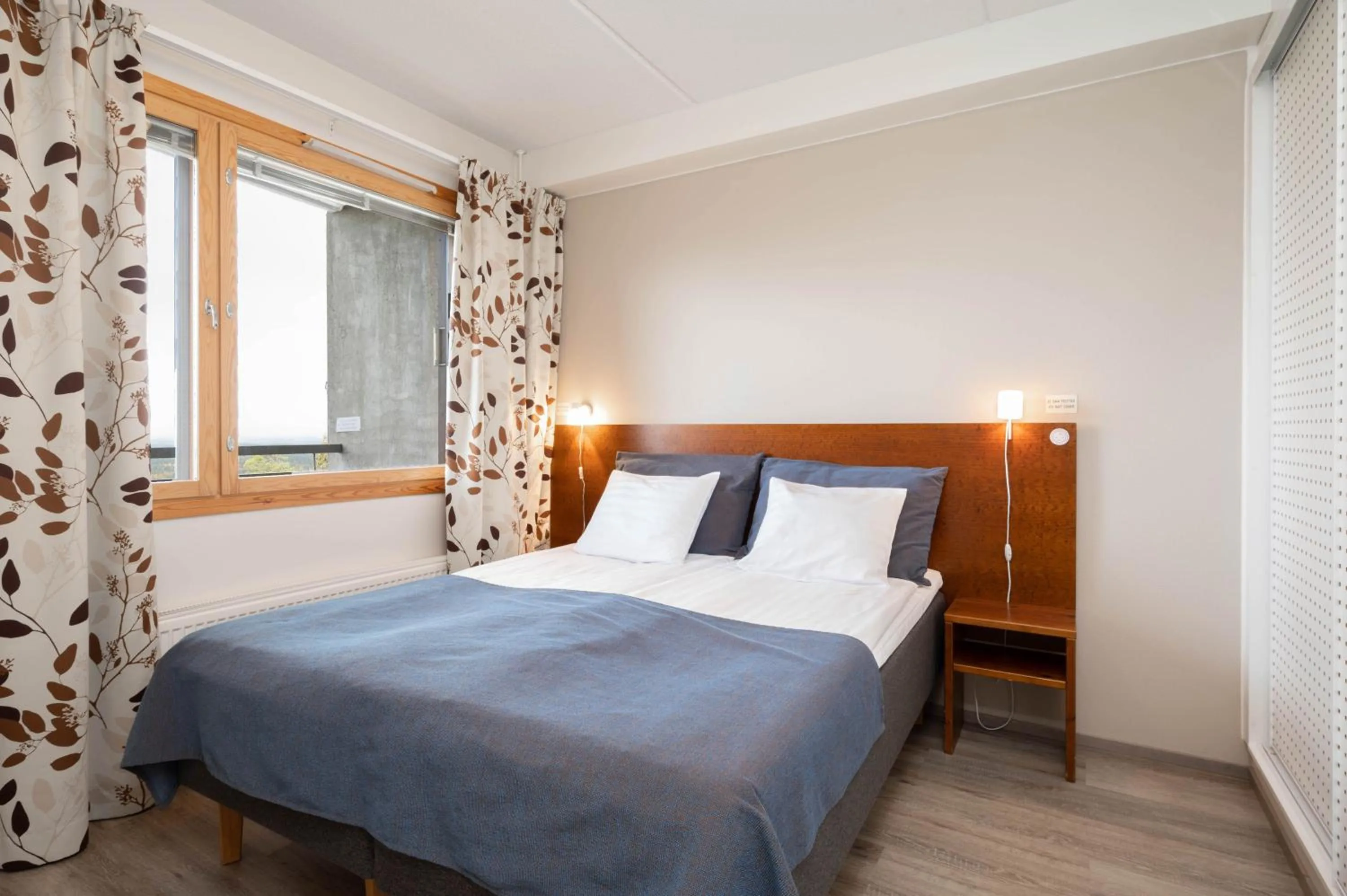 Decorative detail, Bed in Ski-Inn RukaSuites