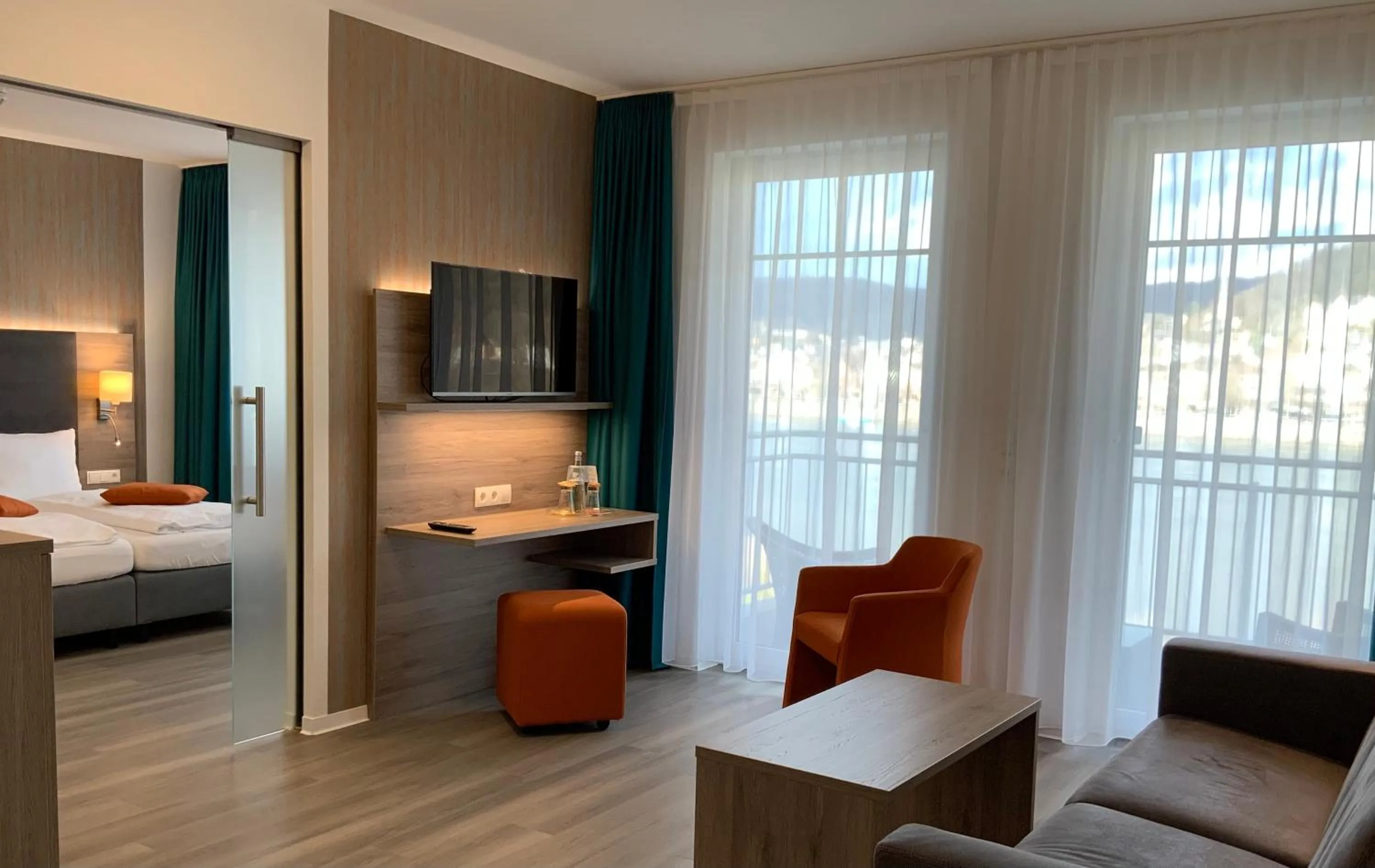 Living room, Bed in RheinVilla ARTE