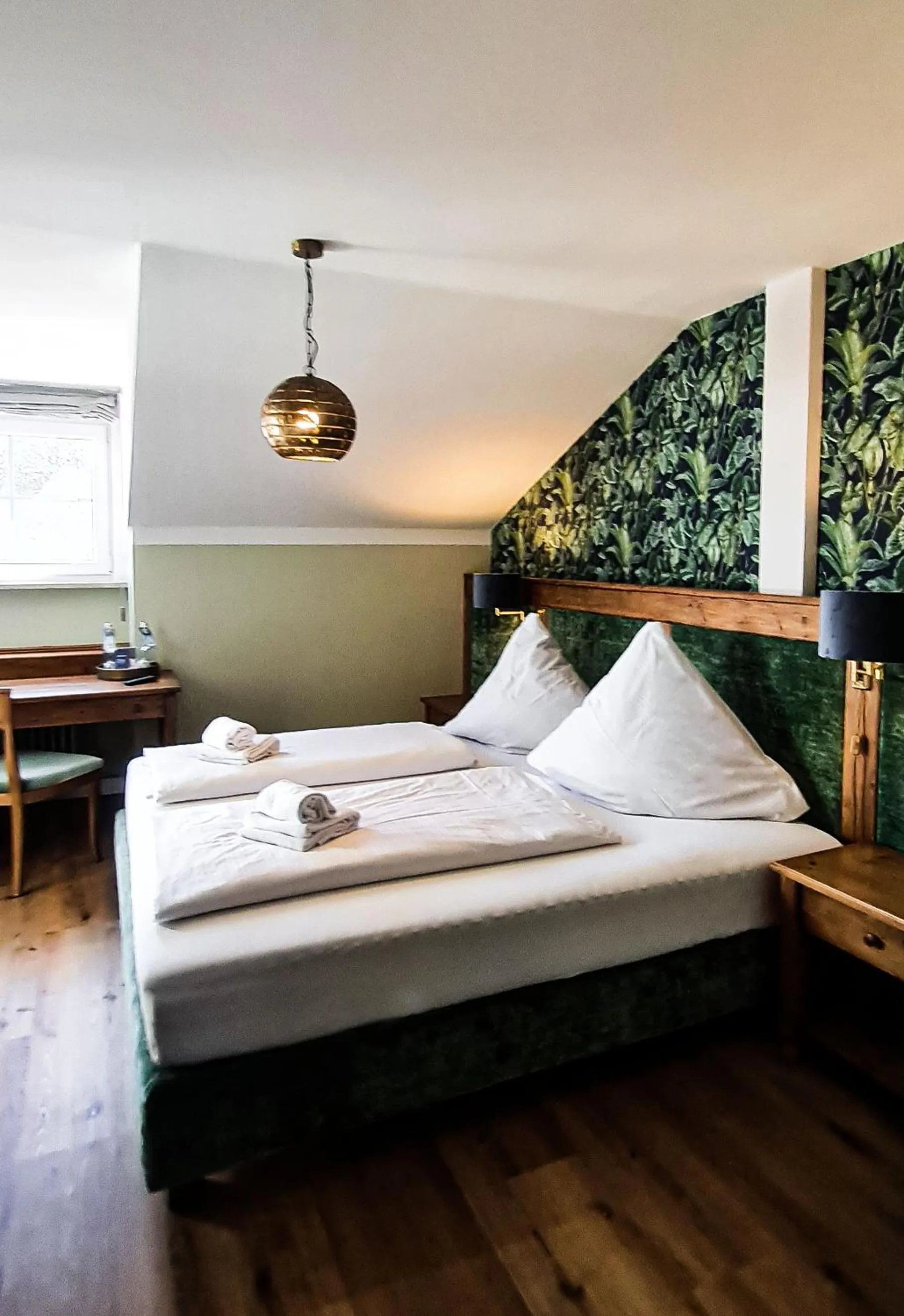 Bed in Hotel Schmiedhubers