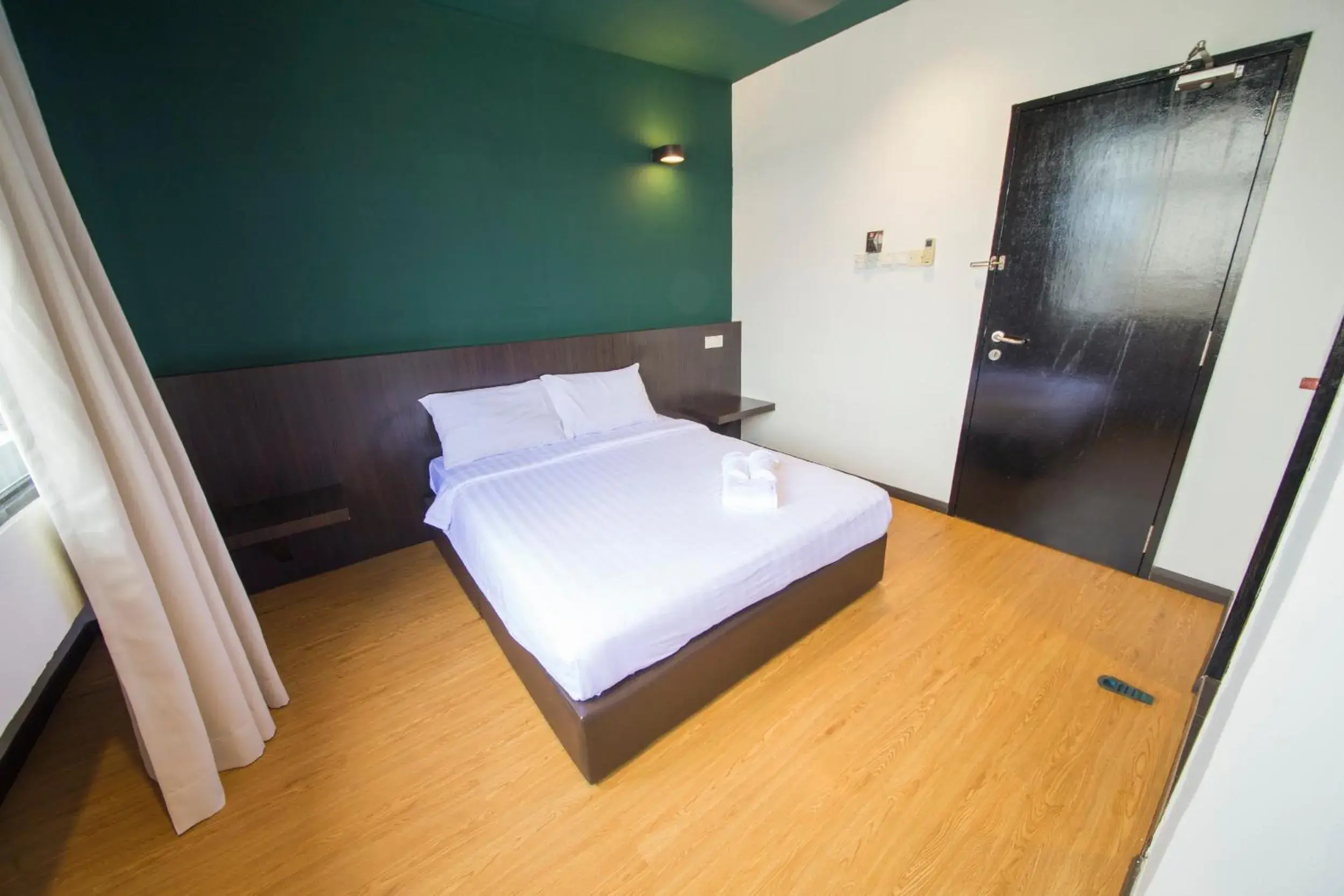 Bed in Room V Jalan Jenang by SECOMS Bed in Room V Jalan Jenang by SECOMS