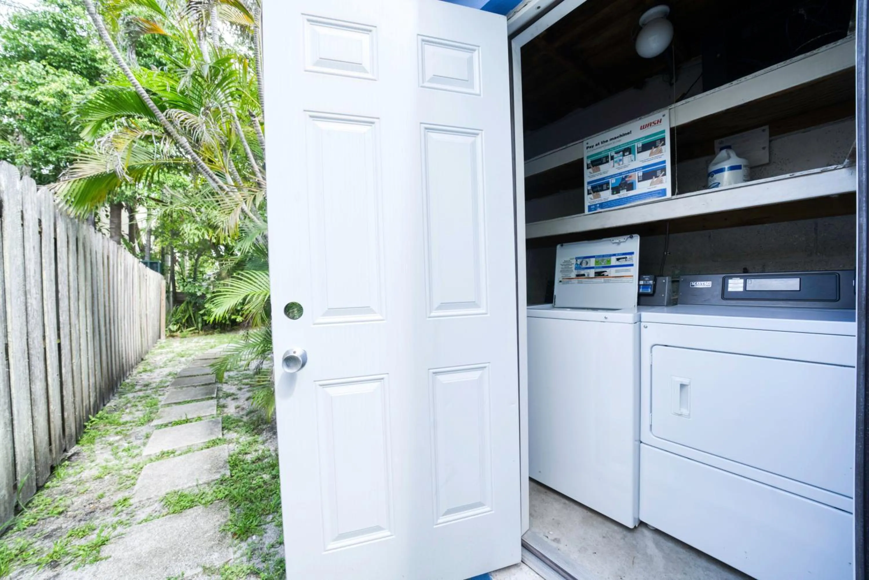 laundry in The Jasmine Apartments by Lowkl