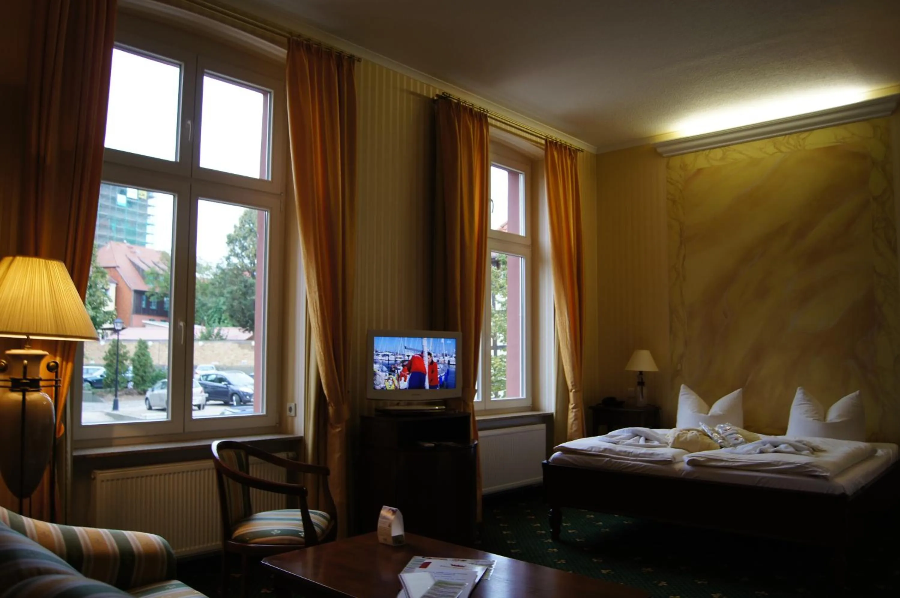 Photo of the whole room, Bed in Waren Müritz Hotel Harmonie