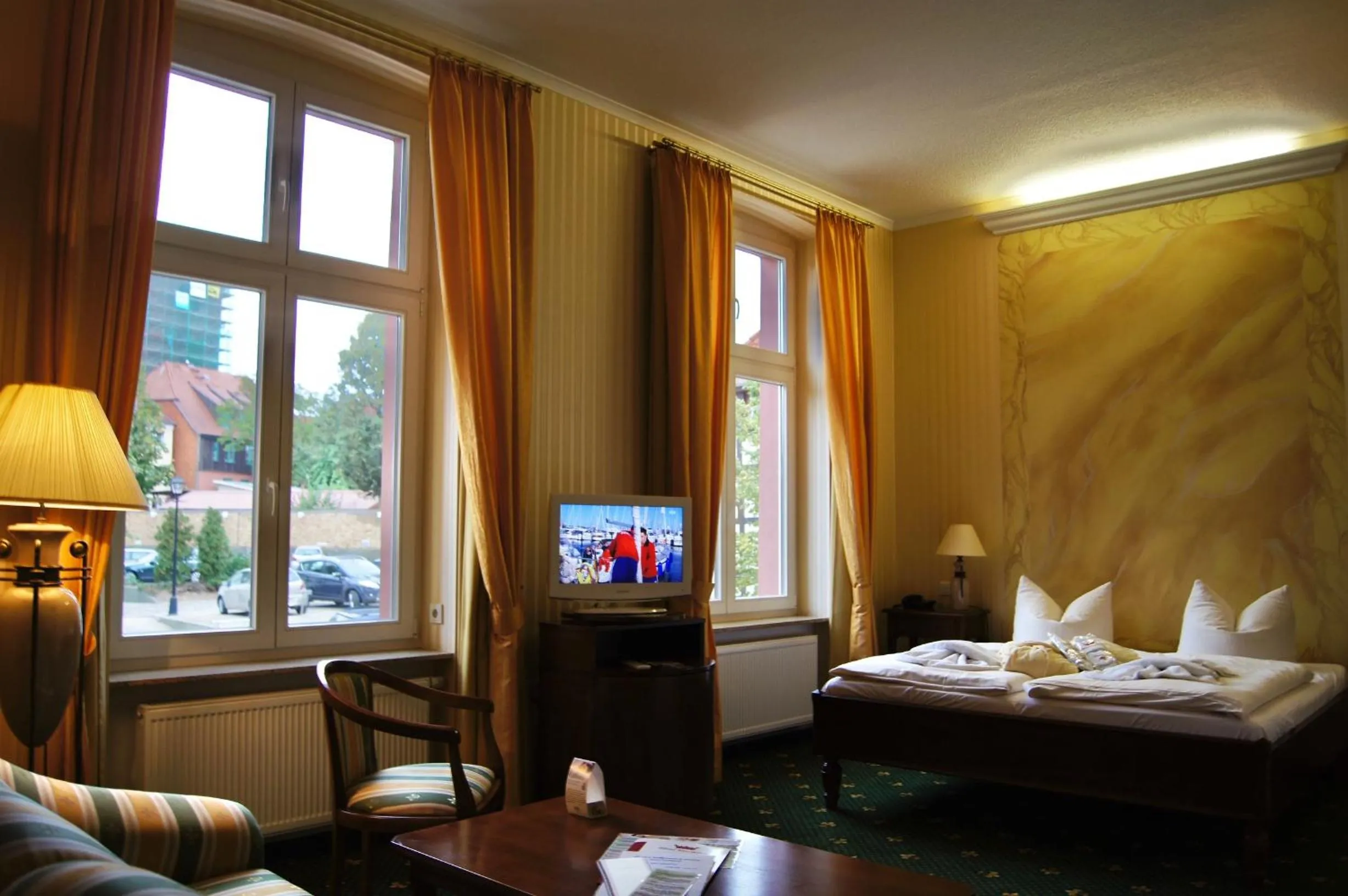 Photo of the whole room, Bed in Waren Müritz Hotel Harmonie