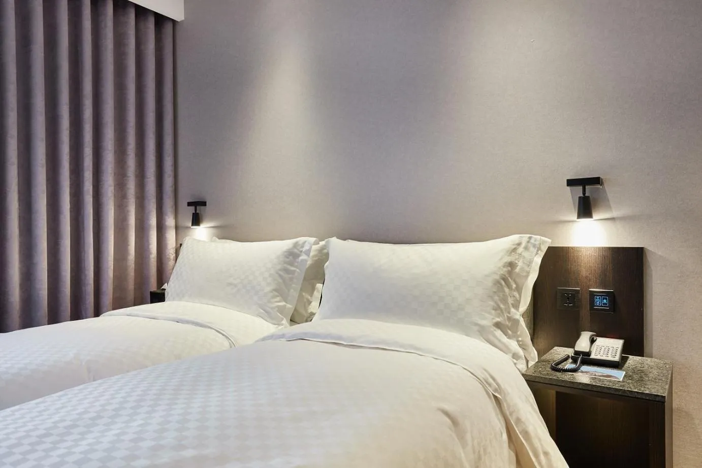 Bed in The Tango Hotel Taipei Shilin