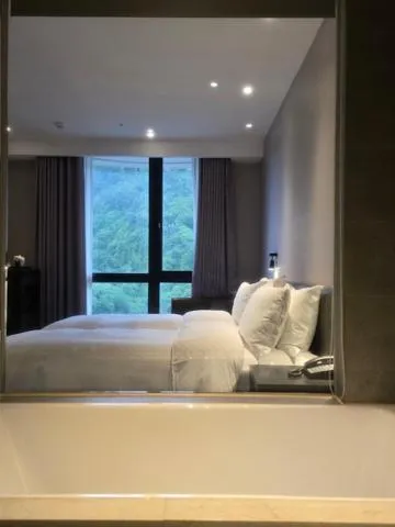 Bed in The Tango Hotel Taipei Shilin