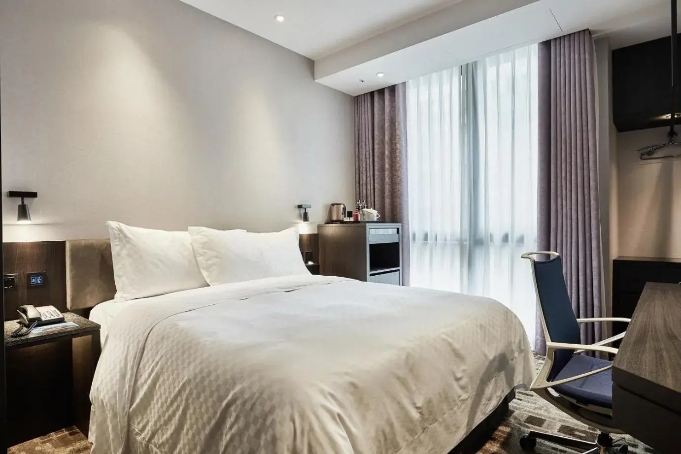 Bed in The Tango Hotel Taipei Shilin Bed in The Tango Hotel Taipei Shilin