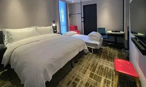 Bed in The Tango Hotel Taipei Shilin Bed in The Tango Hotel Taipei Shilin