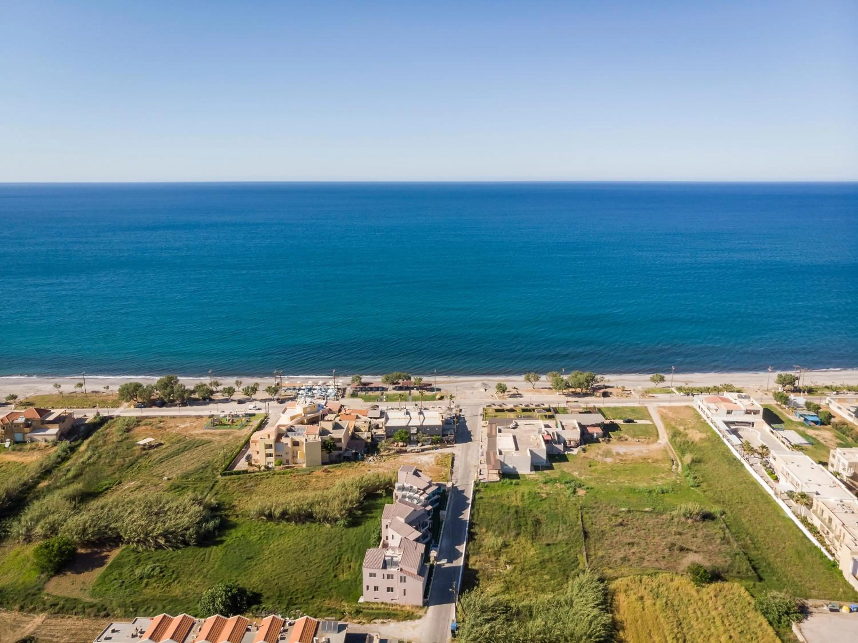 Beach in Aegean Breeze Luxury Apartments next to the sea