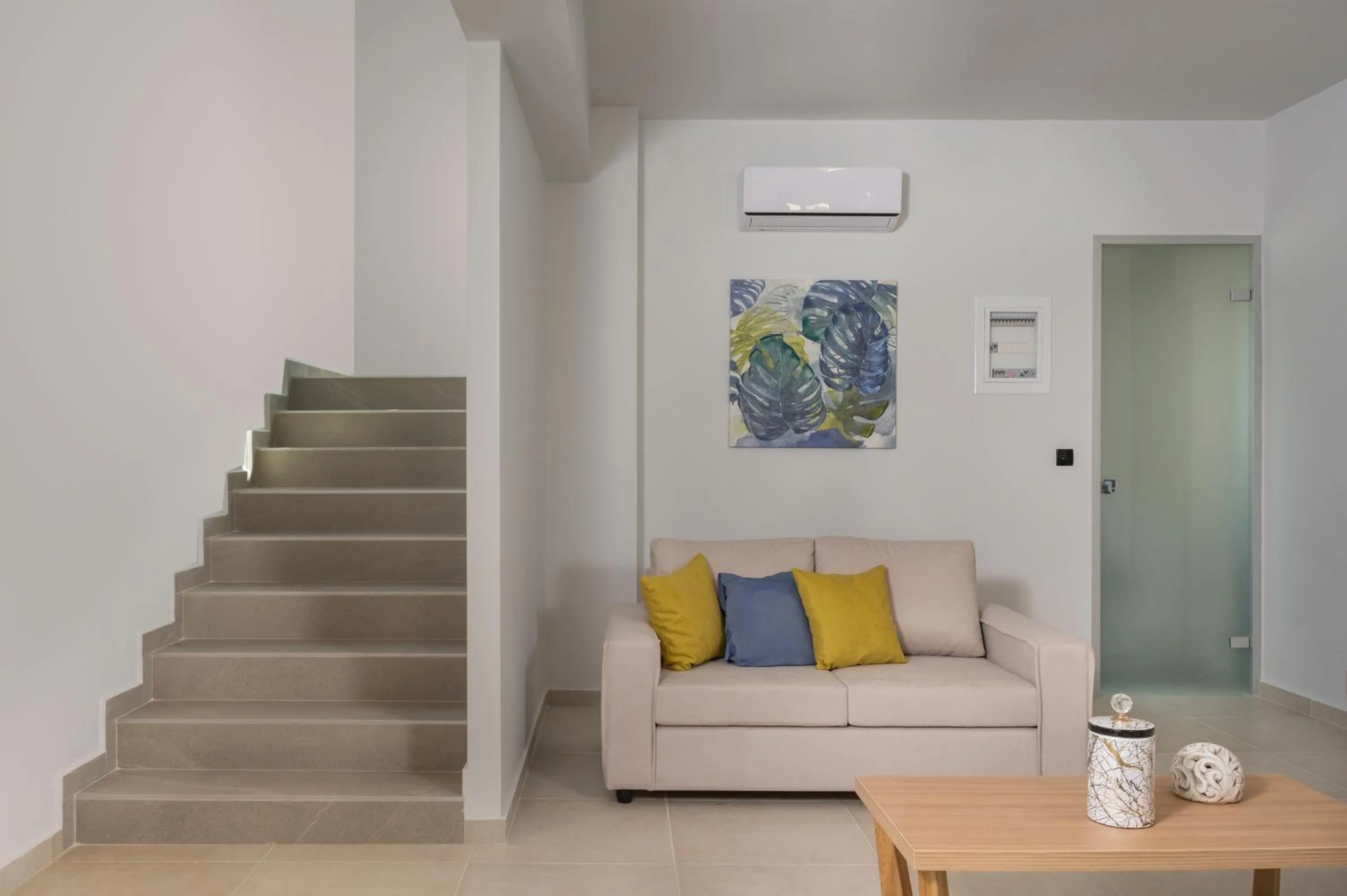 Living room in Aegean Breeze Luxury Apartments next to the sea