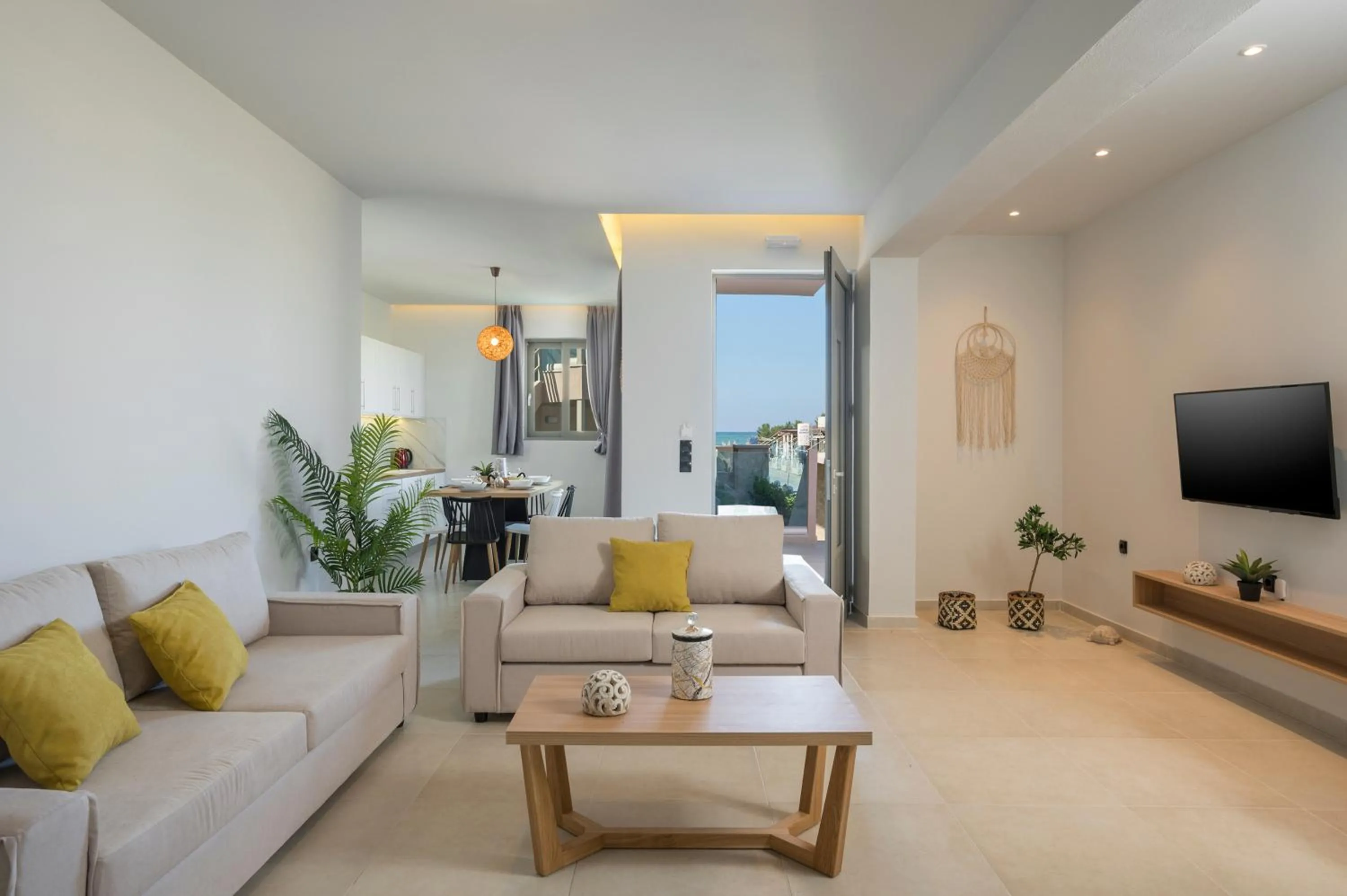 Living room in Aegean Breeze Luxury Apartments next to the sea