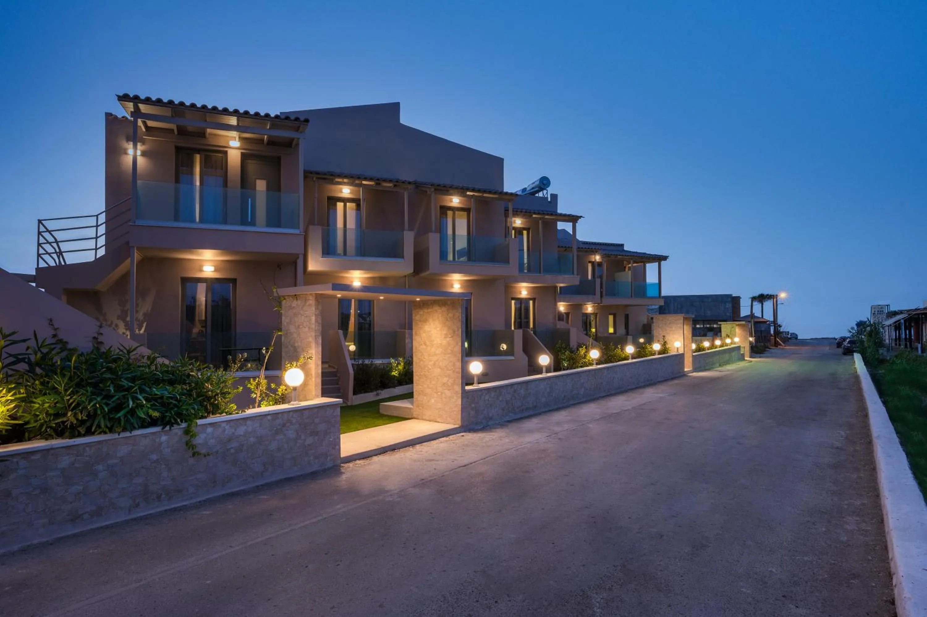 Property building in Aegean Breeze Luxury Apartments next to the sea