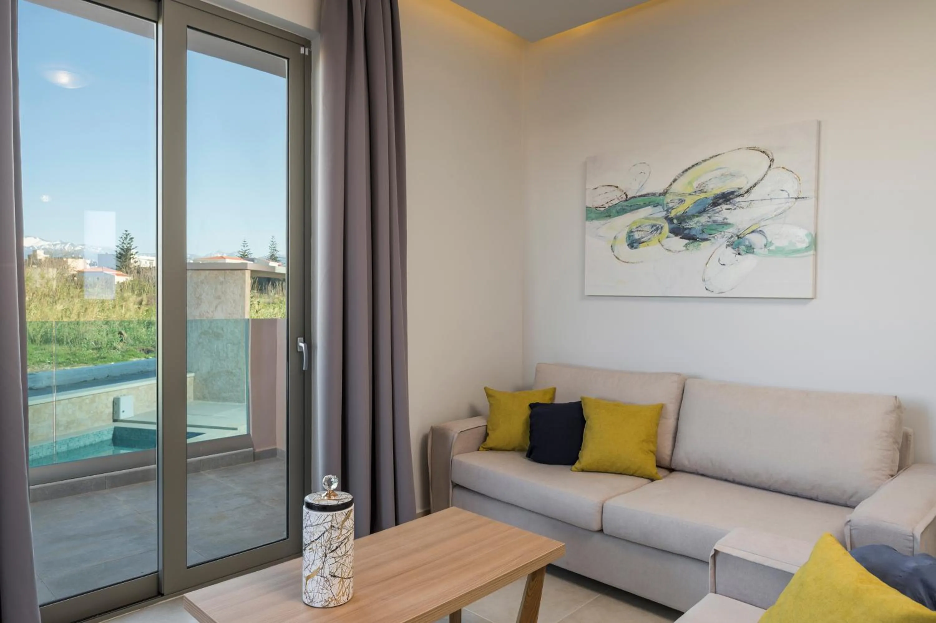Living room in Aegean Breeze Luxury Apartments next to the sea