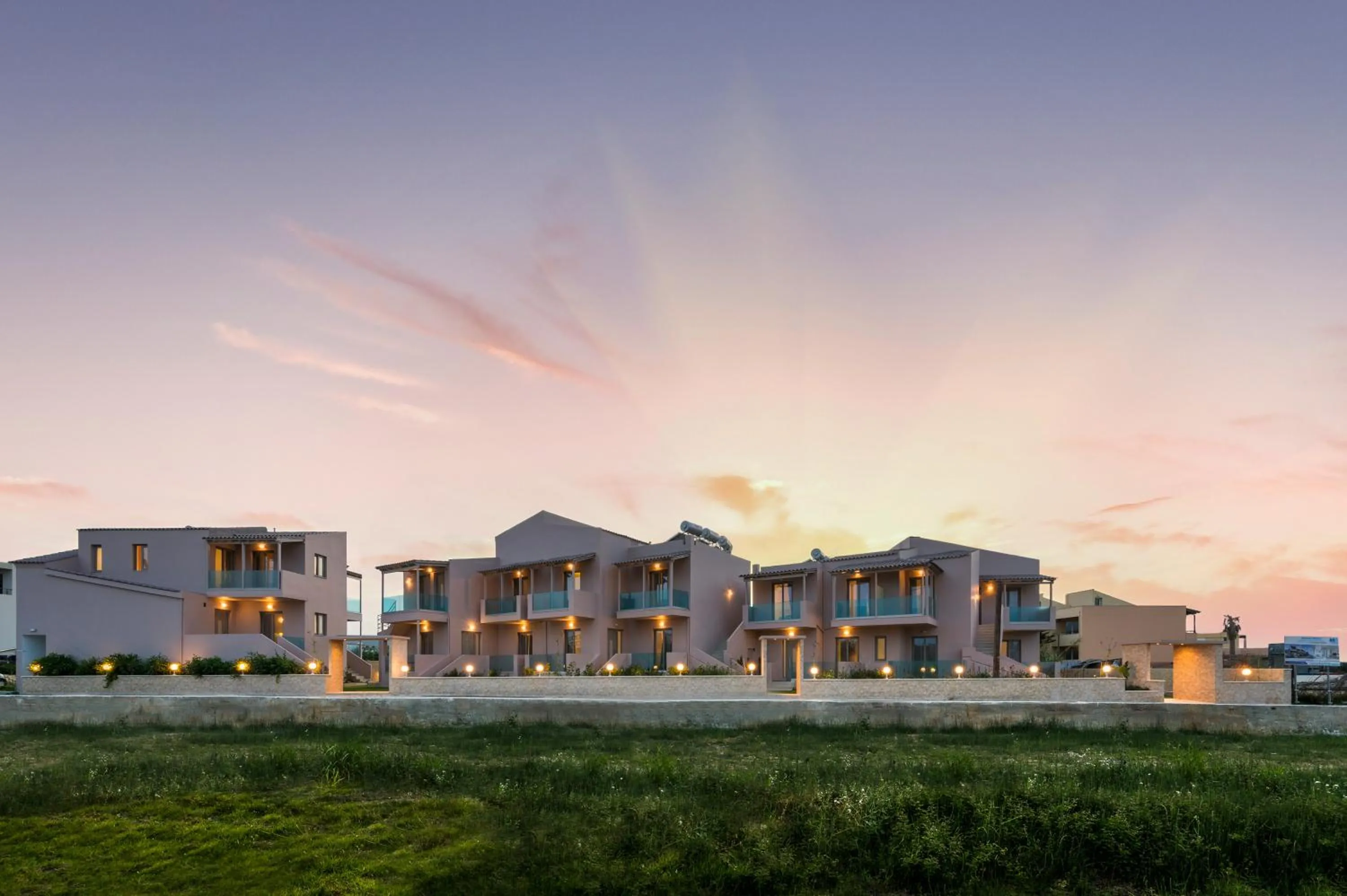 Property building in Aegean Breeze Luxury Apartments next to the sea