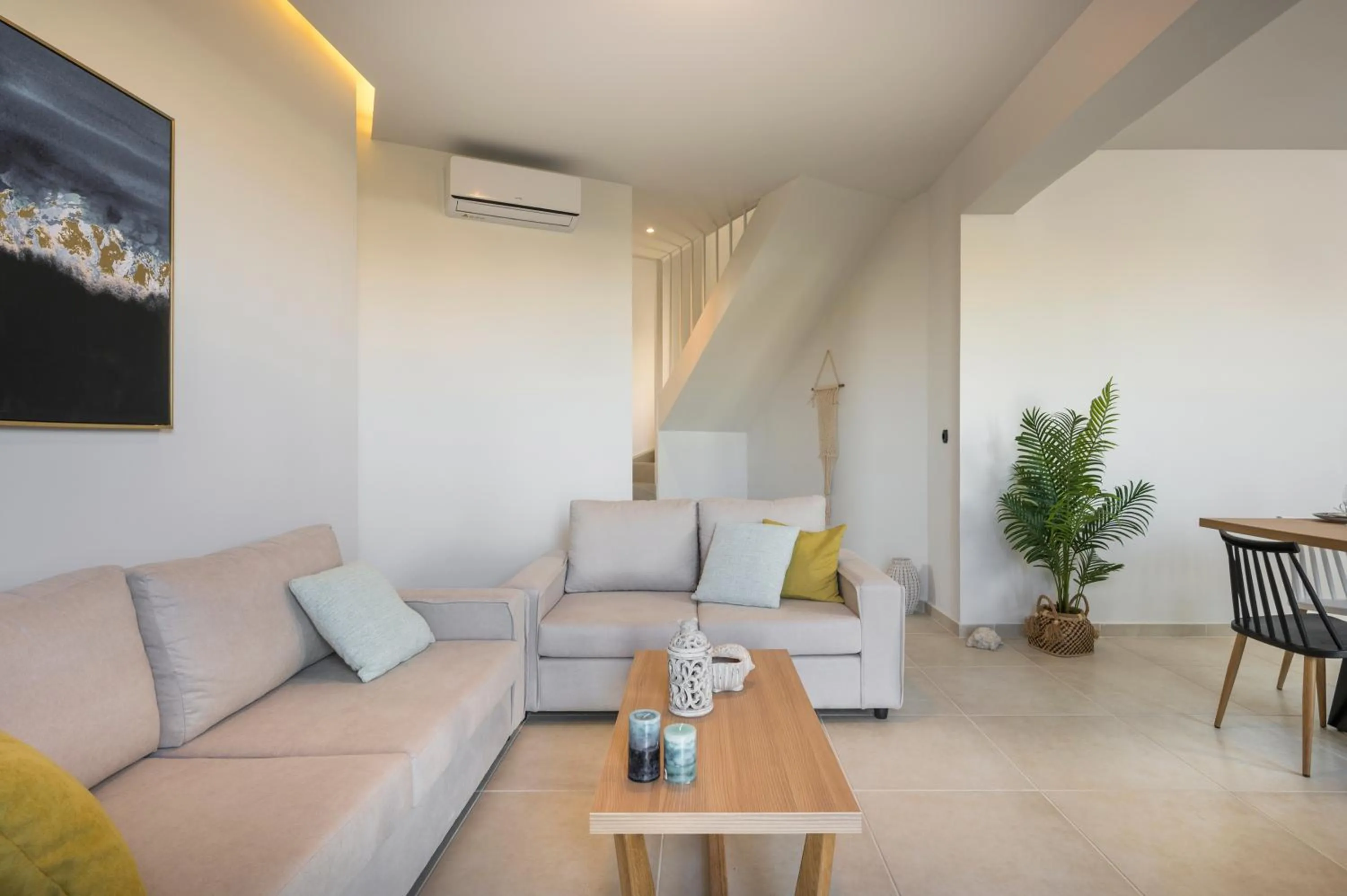 Living room in Aegean Breeze Luxury Apartments next to the sea