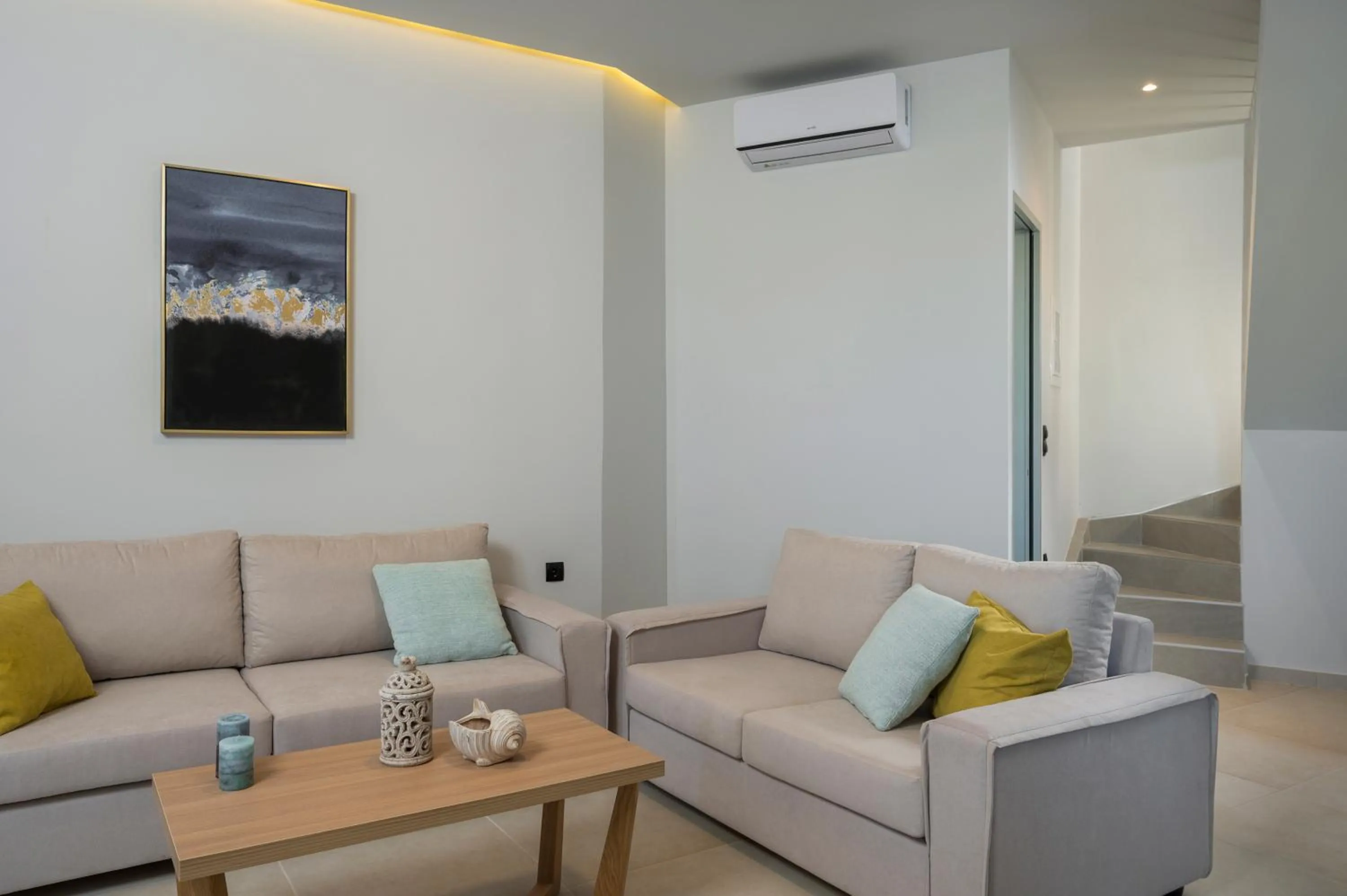 Living room in Aegean Breeze Luxury Apartments next to the sea