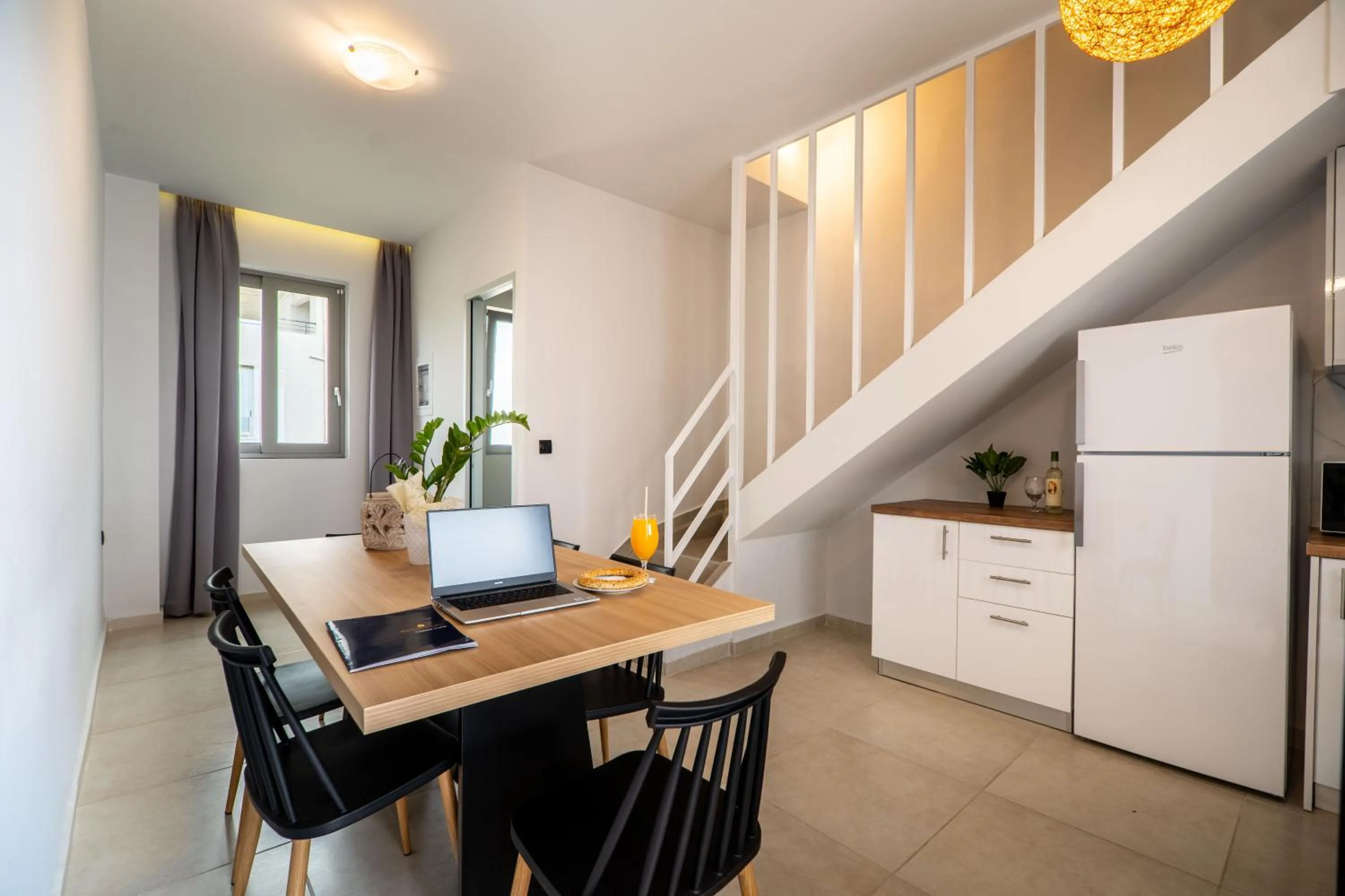 Kitchen or kitchenette in Aegean Breeze Luxury Apartments next to the sea