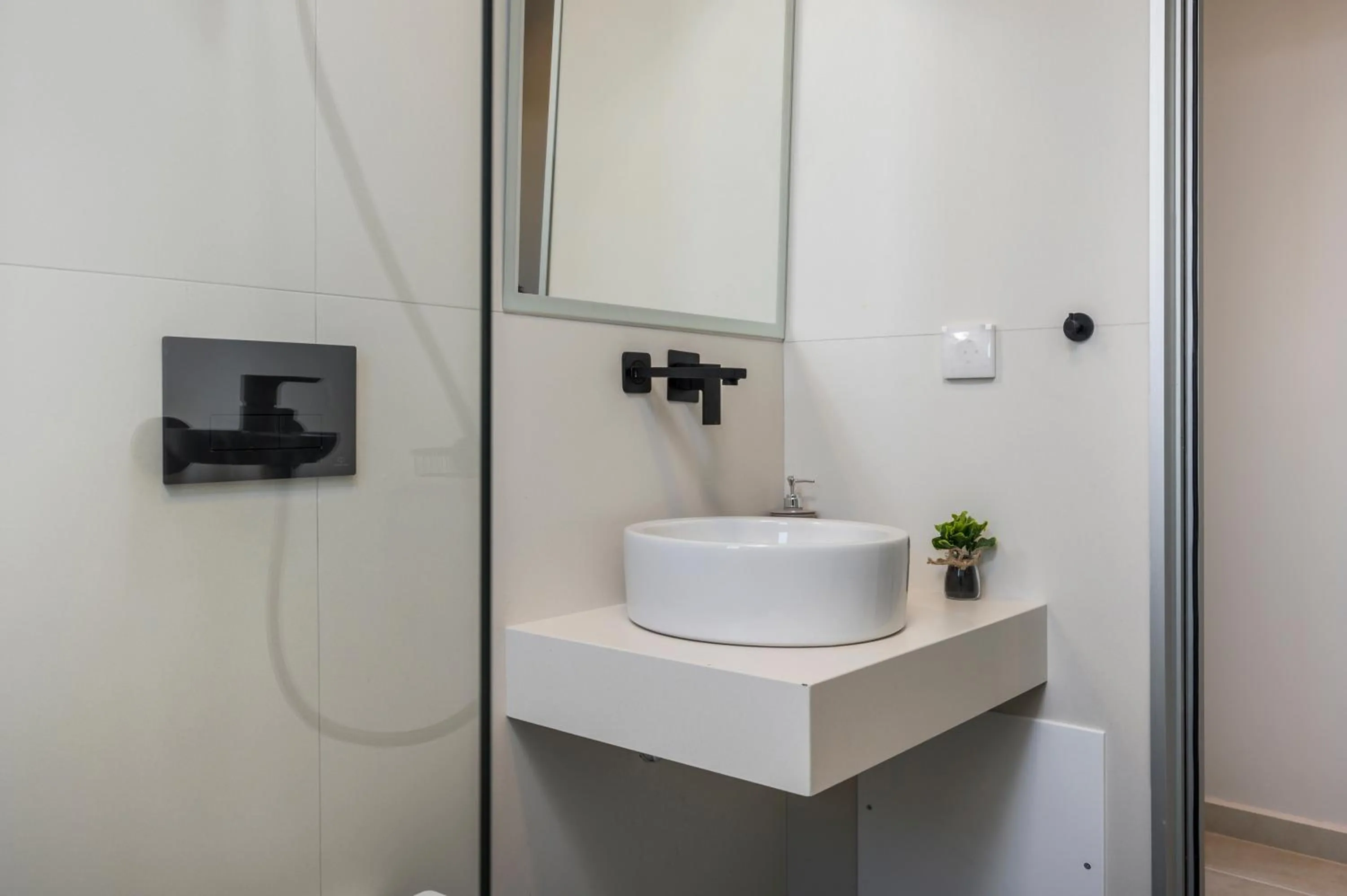 Bathroom in Aegean Breeze Luxury Apartments next to the sea
