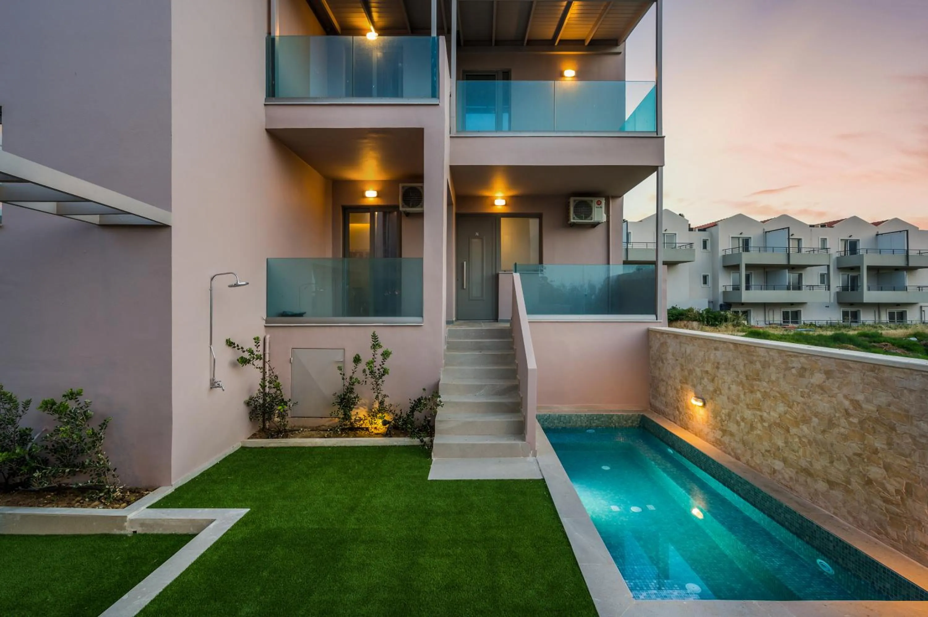 Property building in Aegean Breeze Luxury Apartments next to the sea