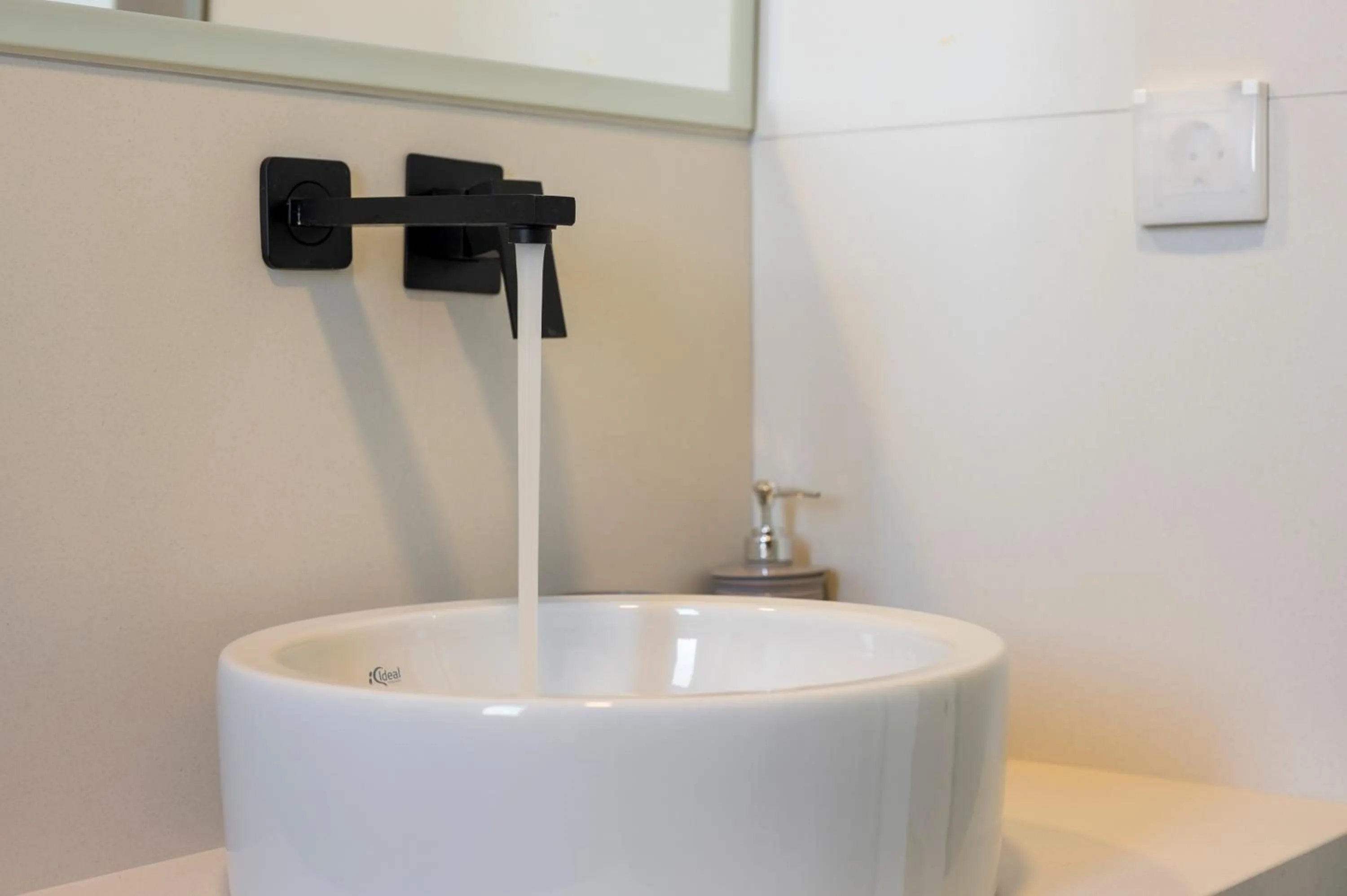 Bathroom in Aegean Breeze Luxury Apartments next to the sea