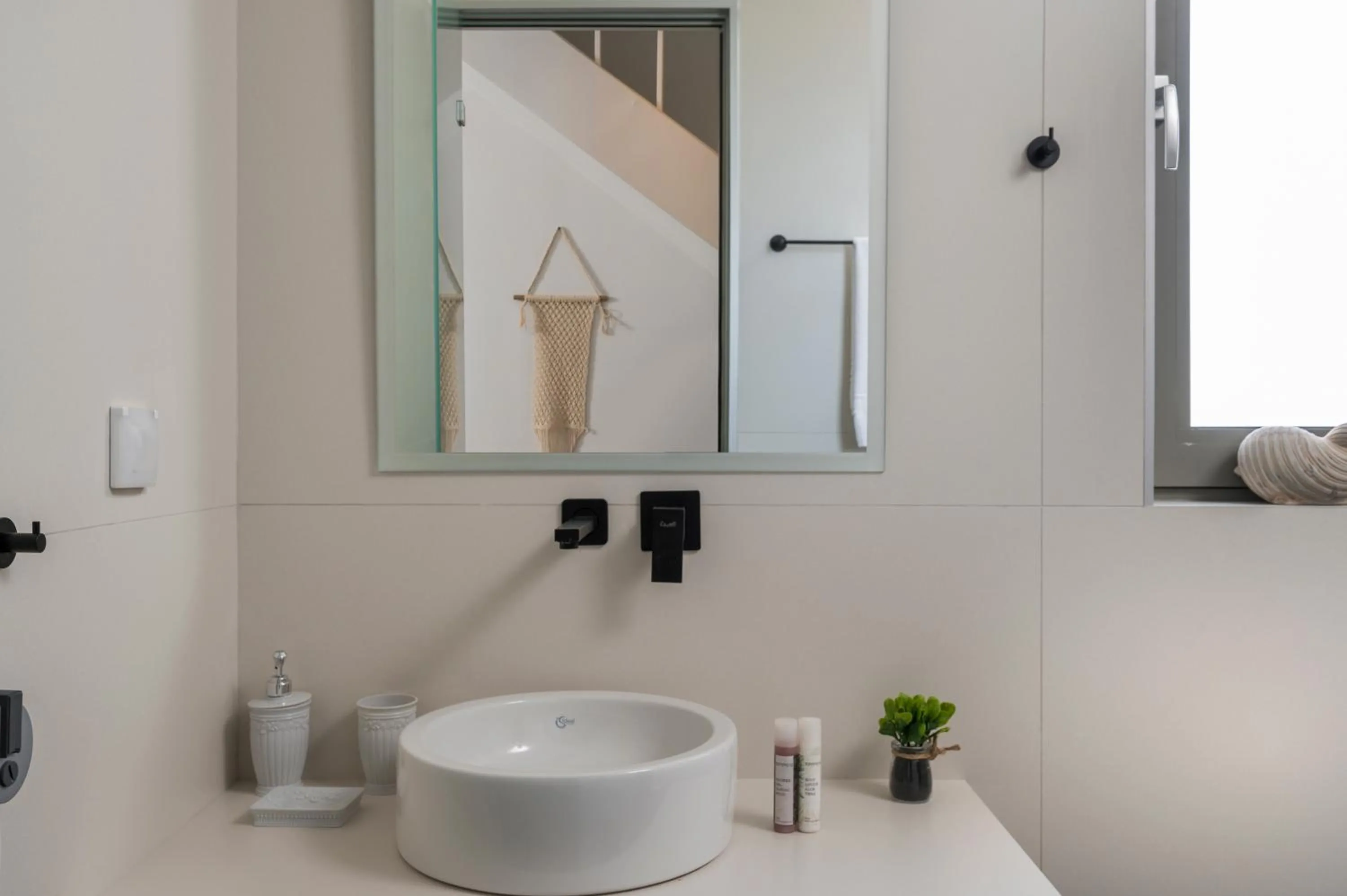 Bathroom in Aegean Breeze Luxury Apartments next to the sea