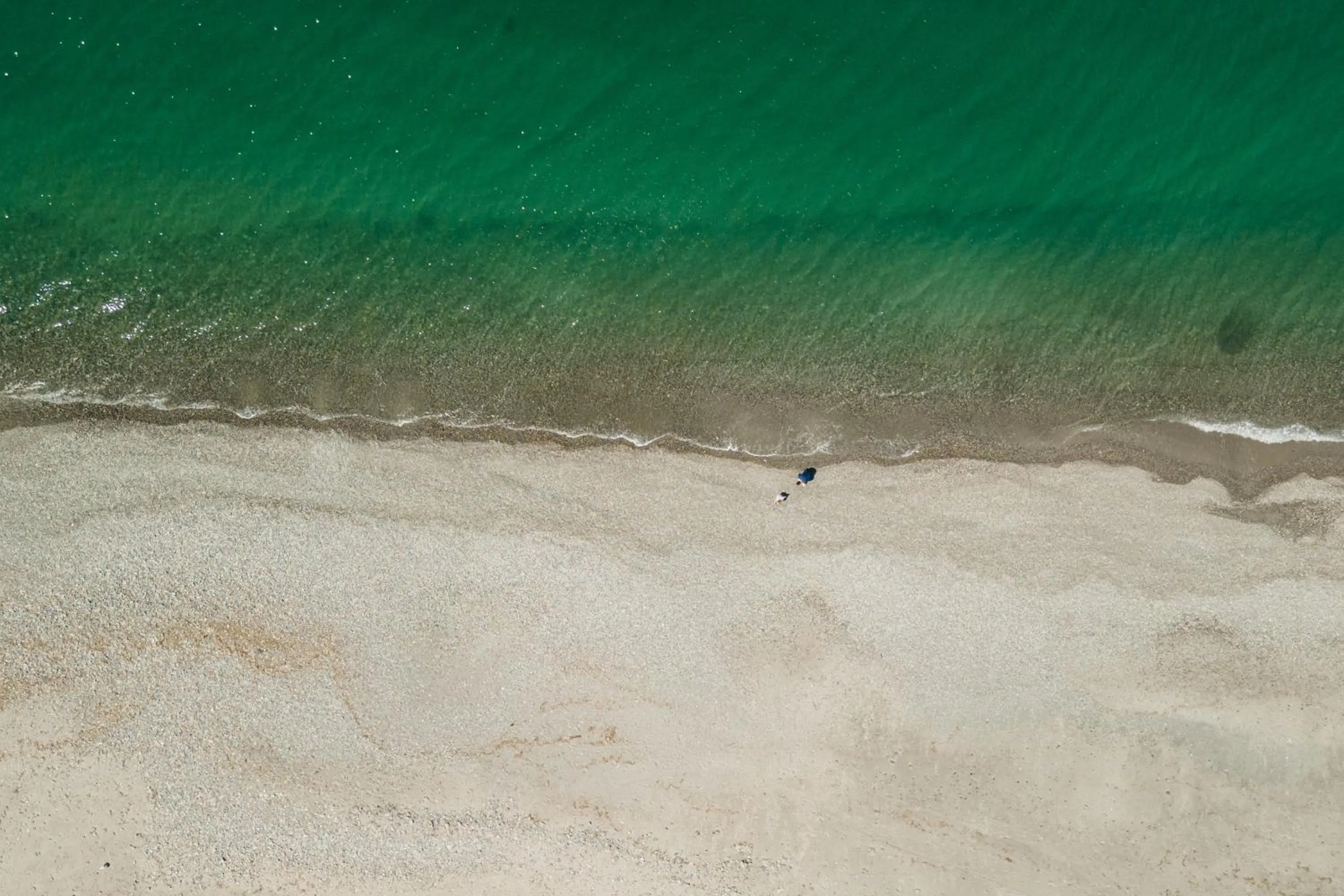 Beach in Aegean Breeze Luxury Apartments next to the sea