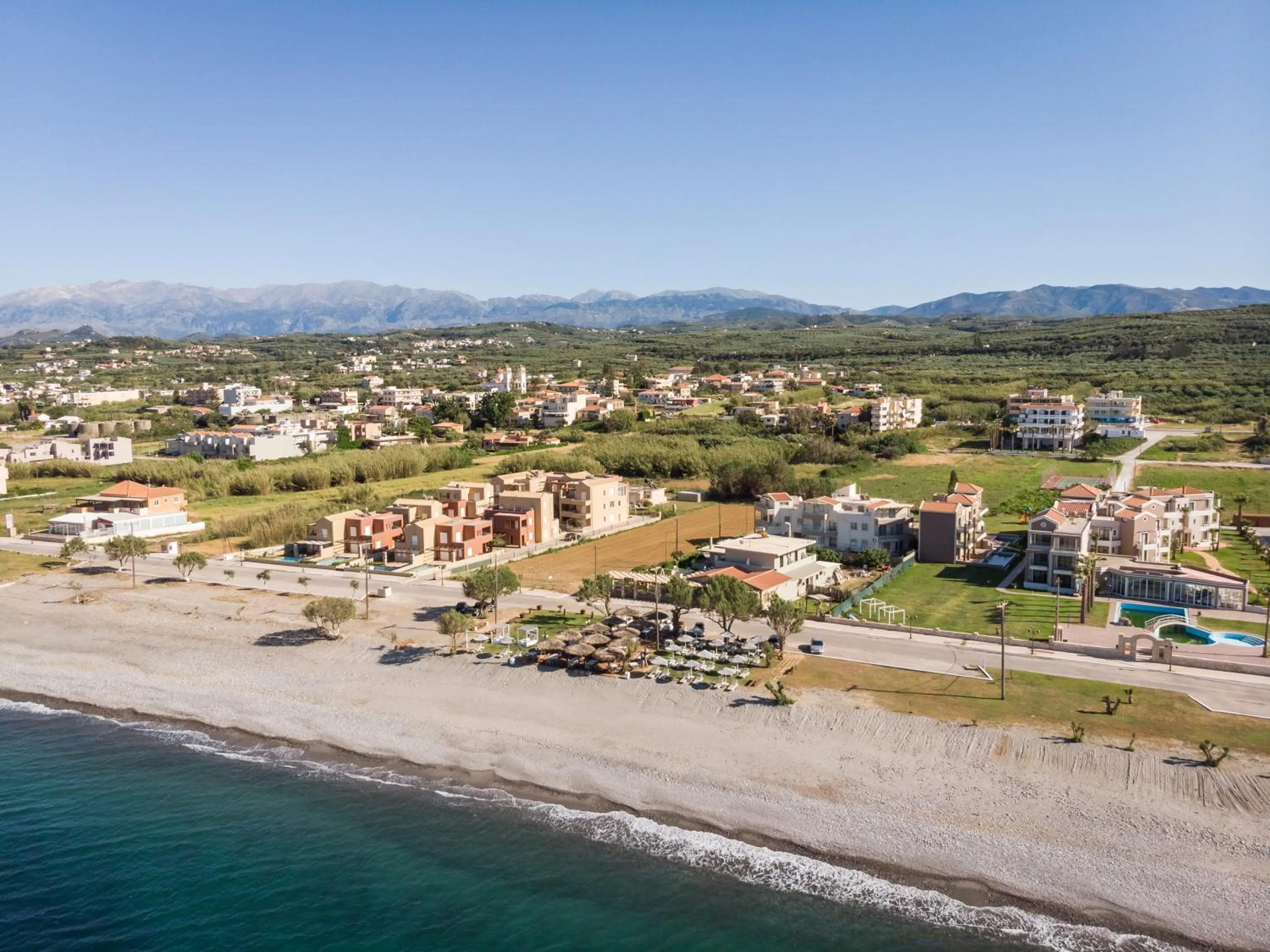 Beach in Aegean Breeze Luxury Apartments next to the sea