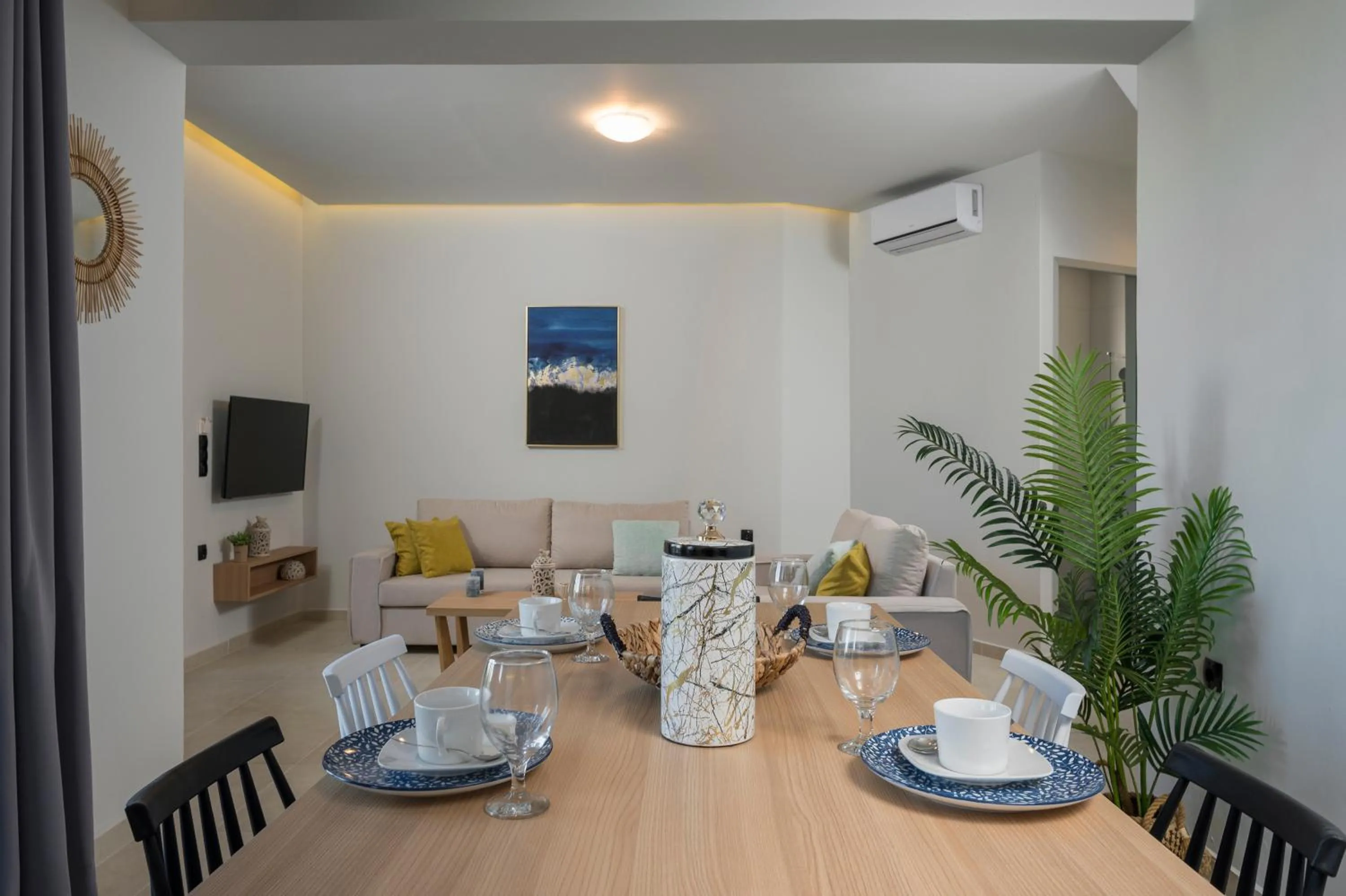 Dining area in Aegean Breeze Luxury Apartments next to the sea