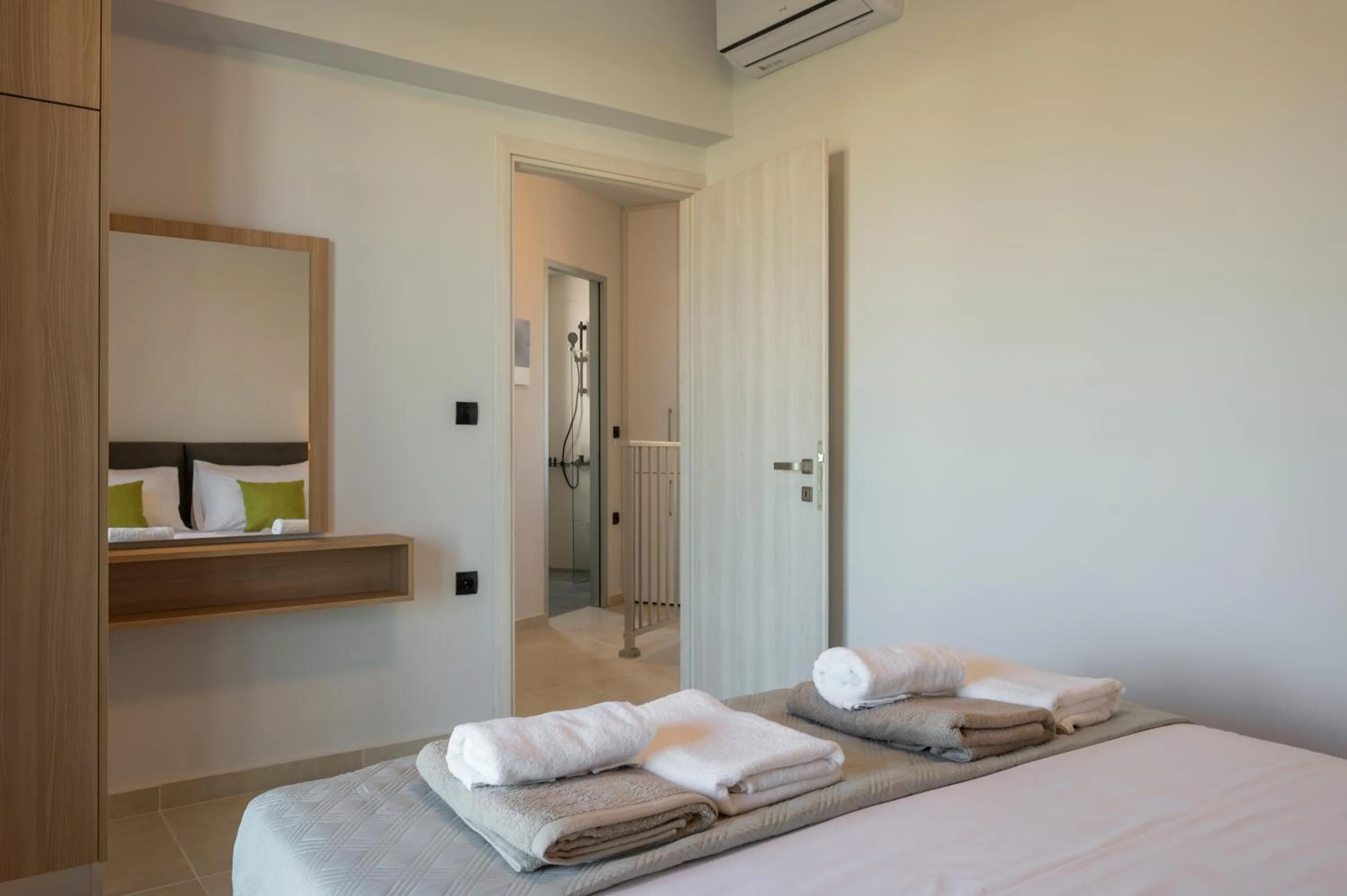 Photo of the whole room, Bed in Aegean Breeze Luxury Apartments next to the sea