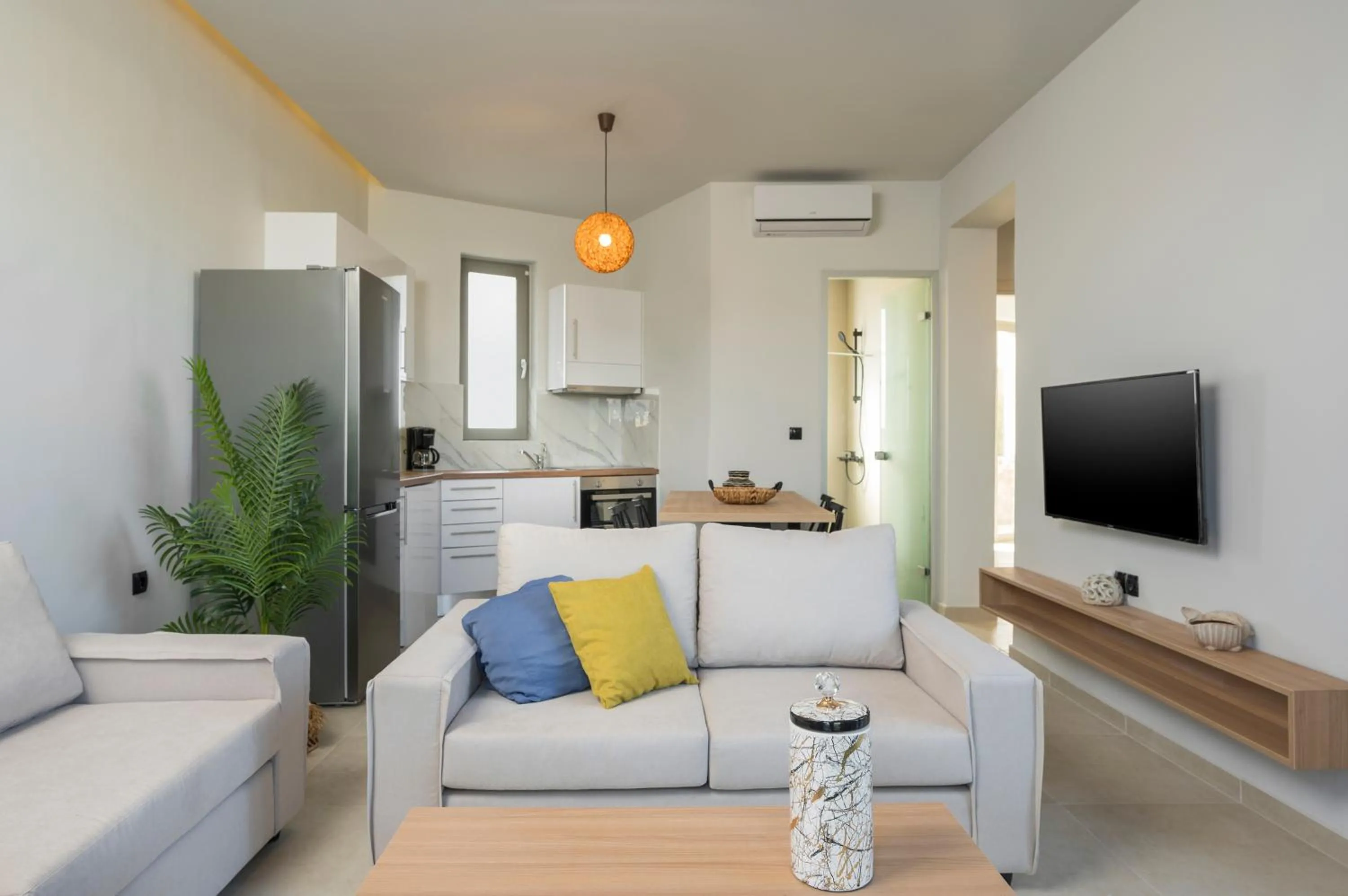 Living room in Aegean Breeze Luxury Apartments next to the sea