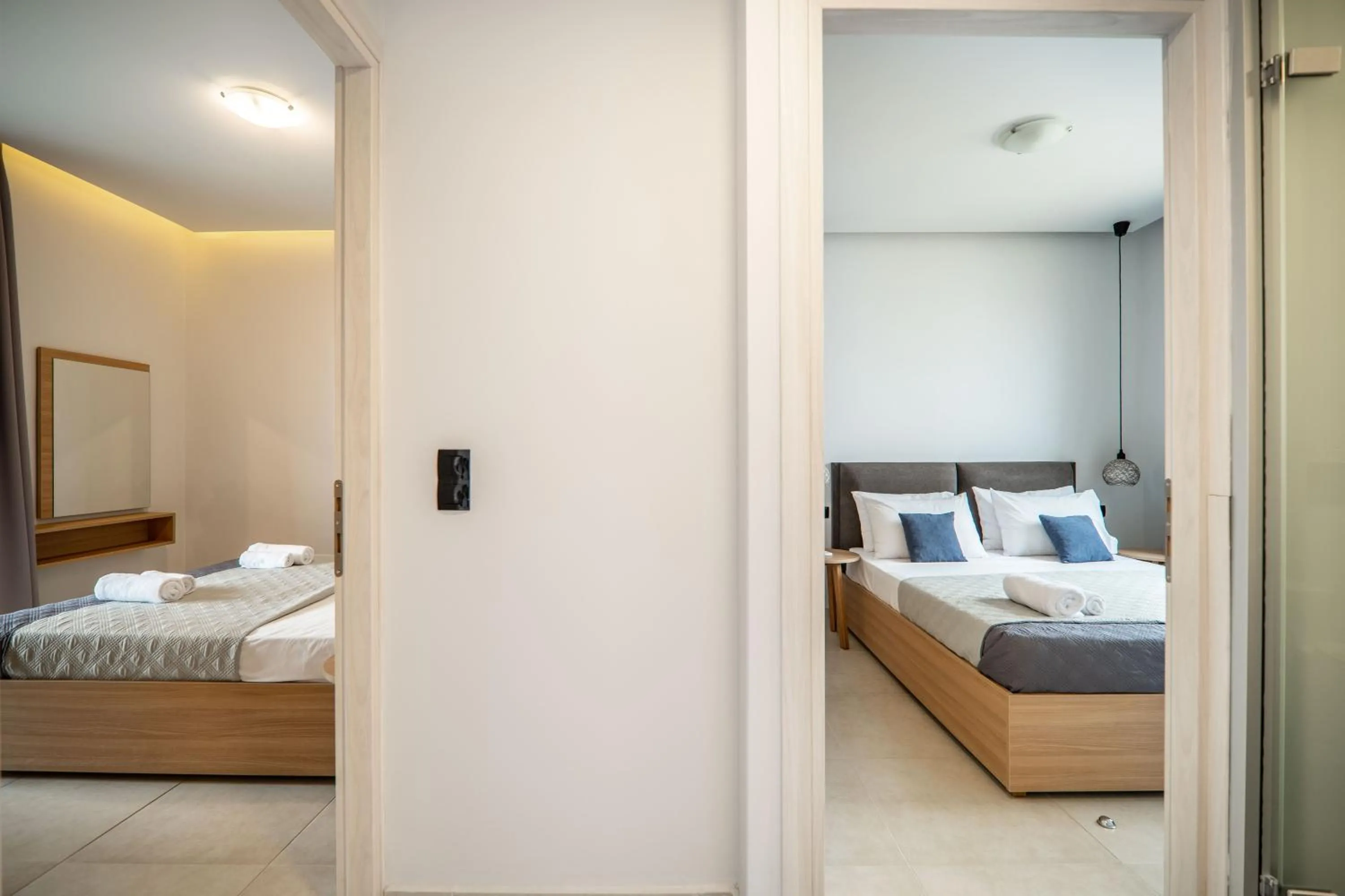 Photo of the whole room, Bed in Aegean Breeze Luxury Apartments next to the sea