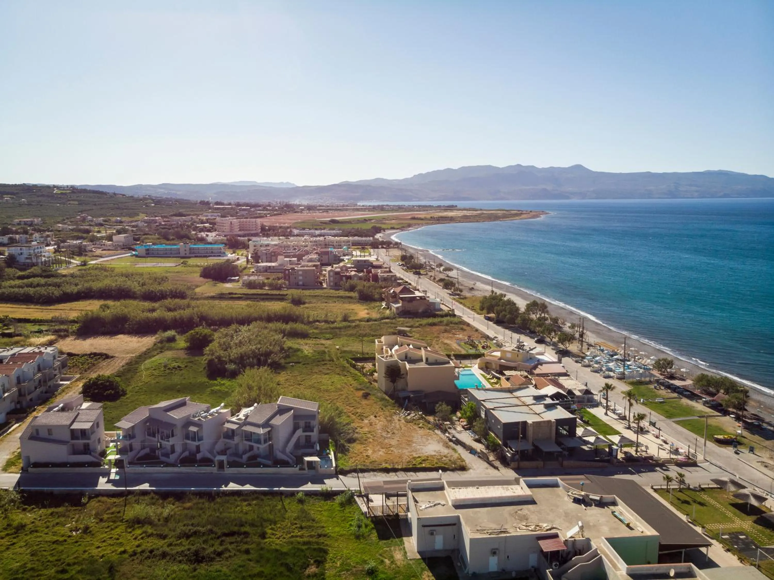 Property building in Aegean Breeze Luxury Apartments next to the sea