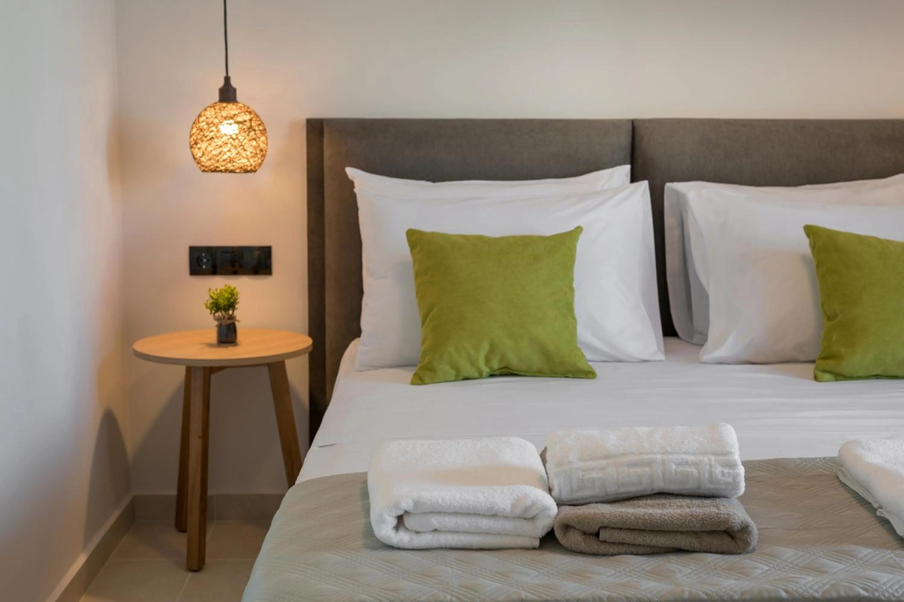 Bedroom, Bed in Aegean Breeze Luxury Apartments next to the sea