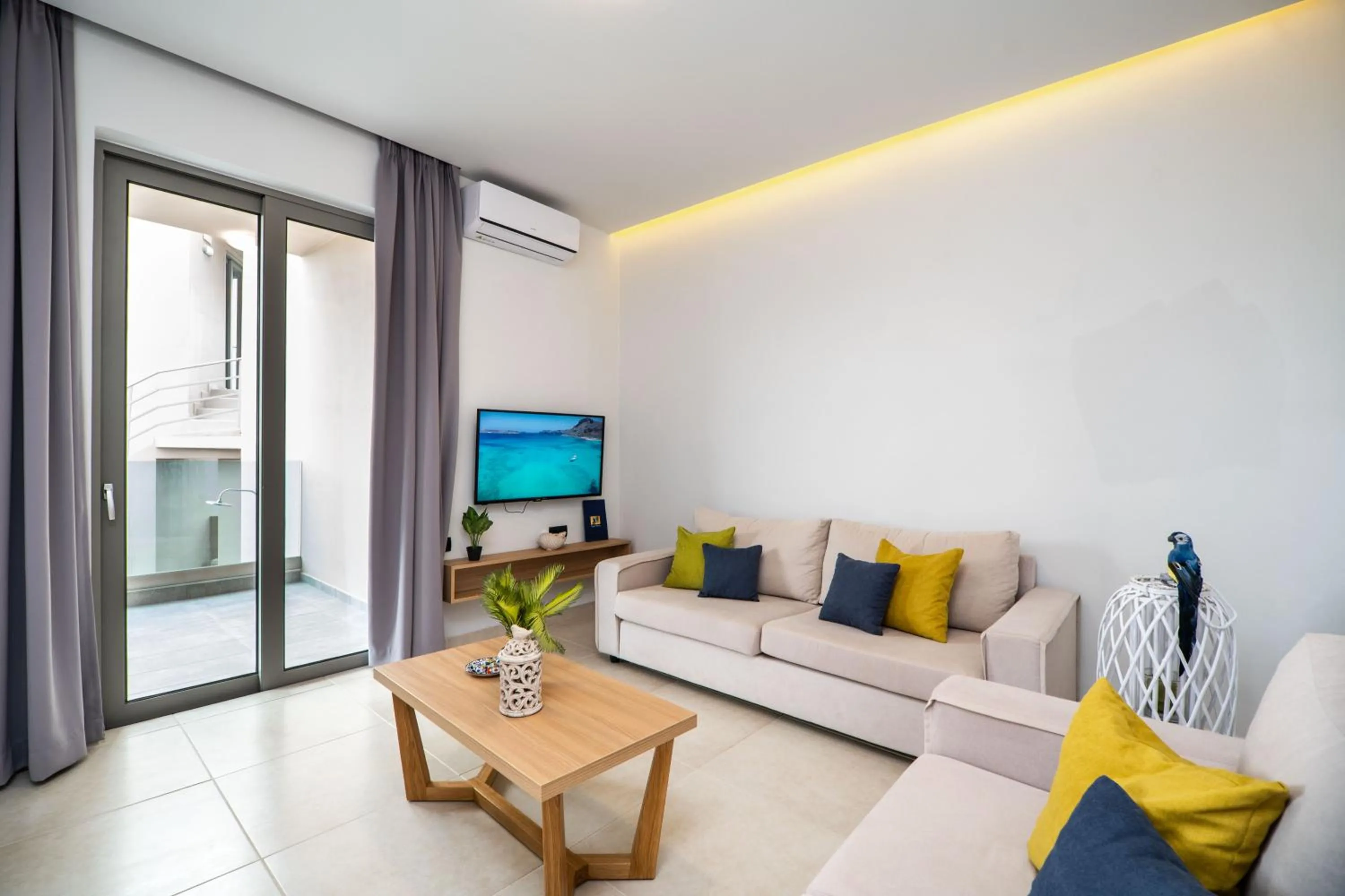 Living room in Aegean Breeze Luxury Apartments next to the sea