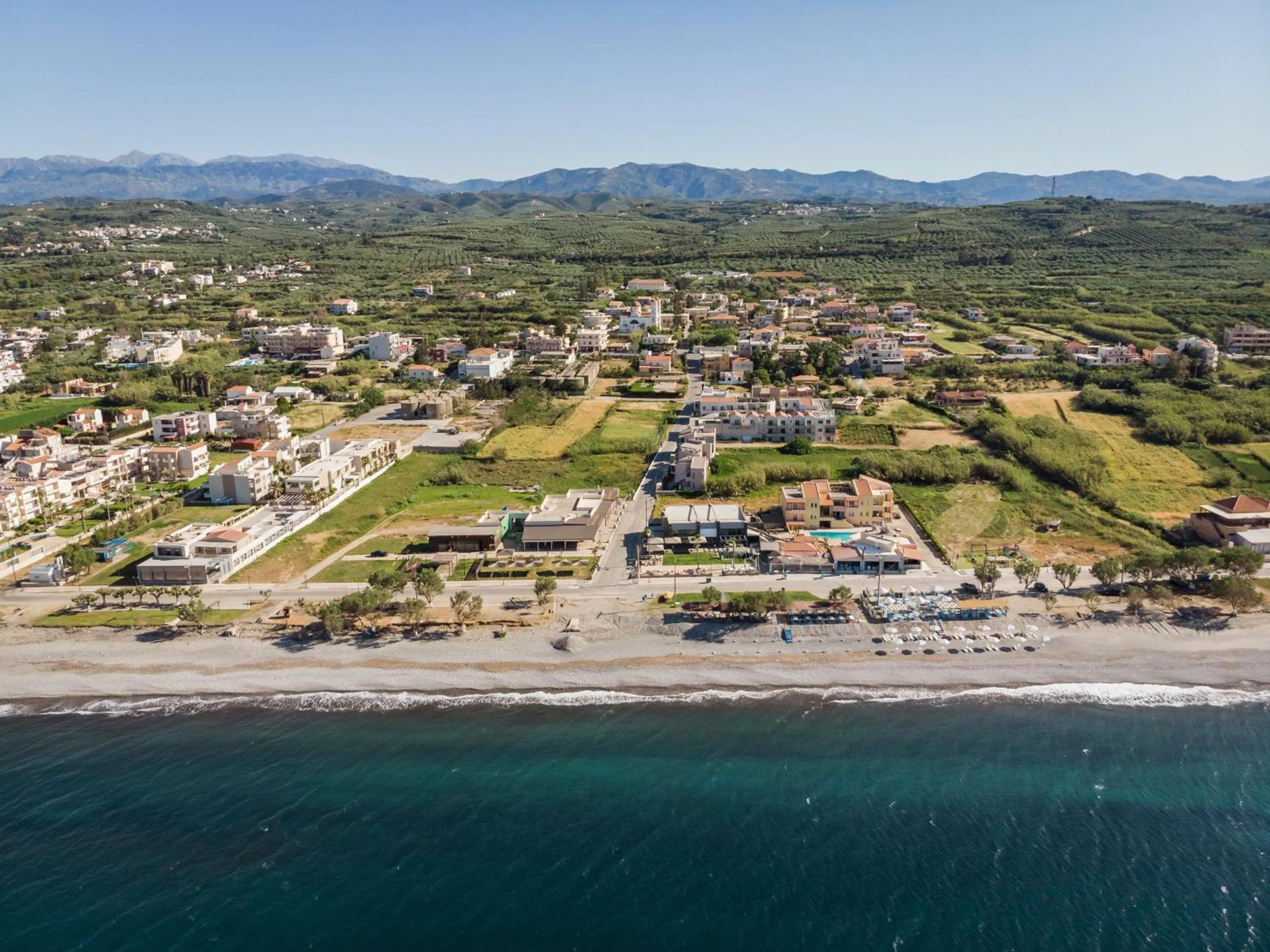 Beach in Aegean Breeze Luxury Apartments next to the sea