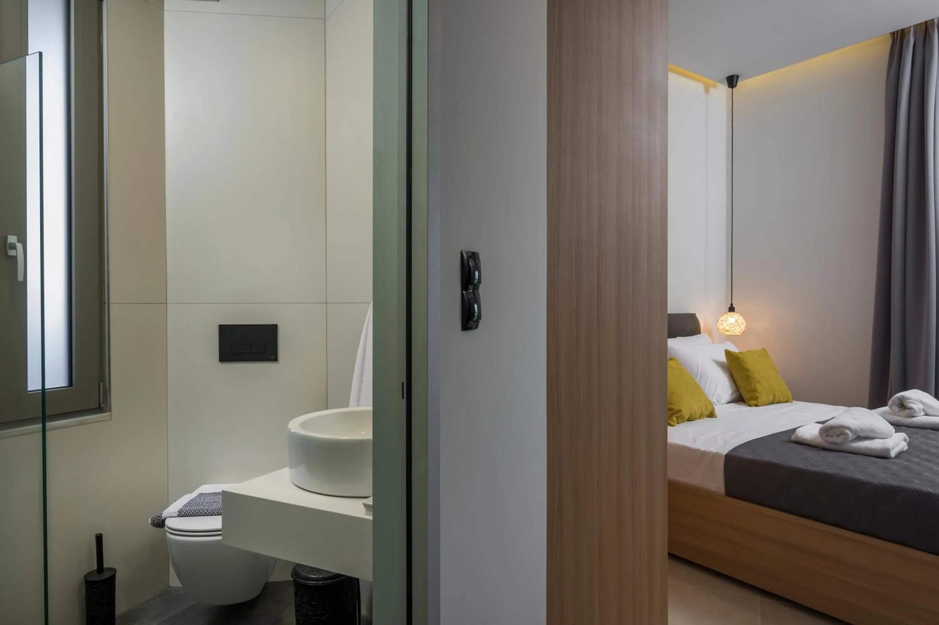 Bedroom, Bed in Aegean Breeze Luxury Apartments next to the sea