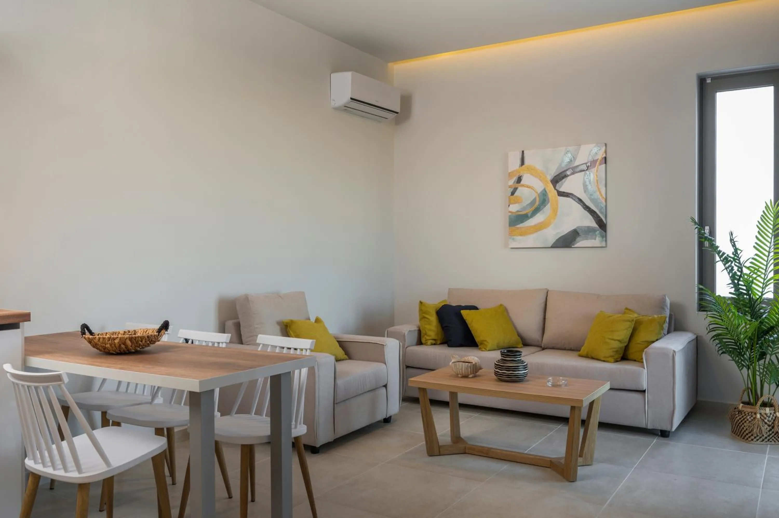 Living room in Aegean Breeze Luxury Apartments next to the sea