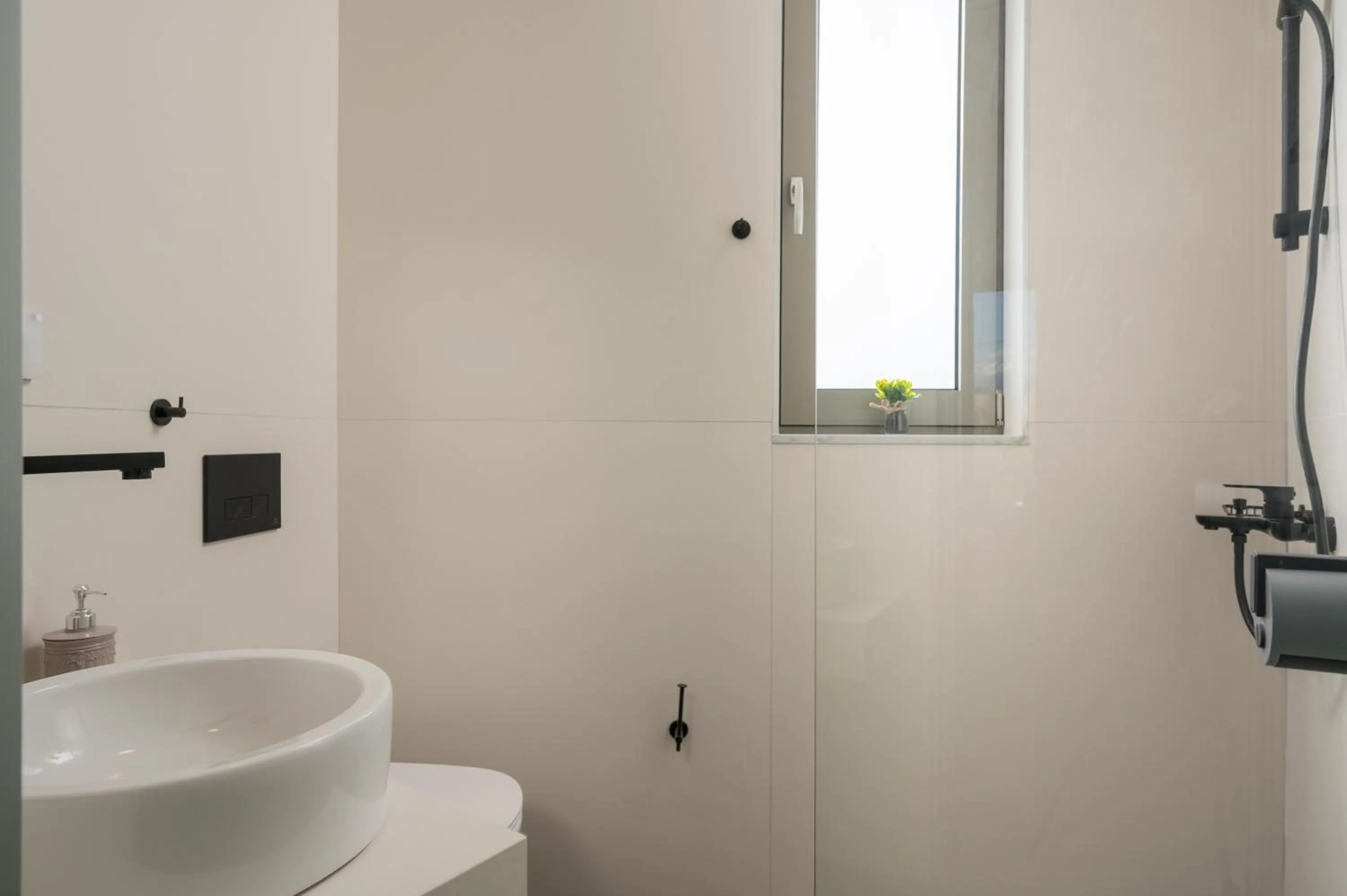 Bathroom in Aegean Breeze Luxury Apartments next to the sea