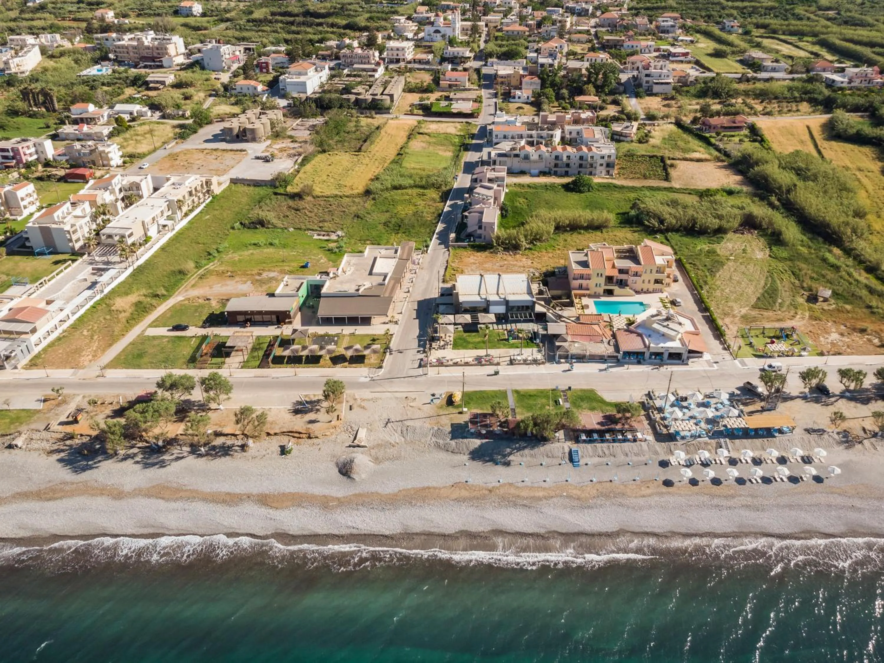 Beach in Aegean Breeze Luxury Apartments next to the sea