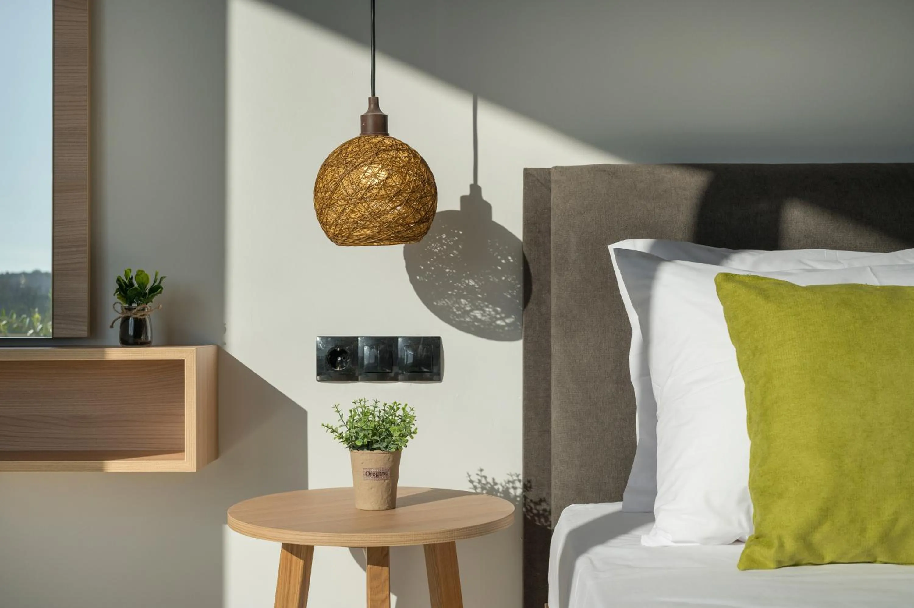 Bed in Aegean Breeze Luxury Apartments next to the sea