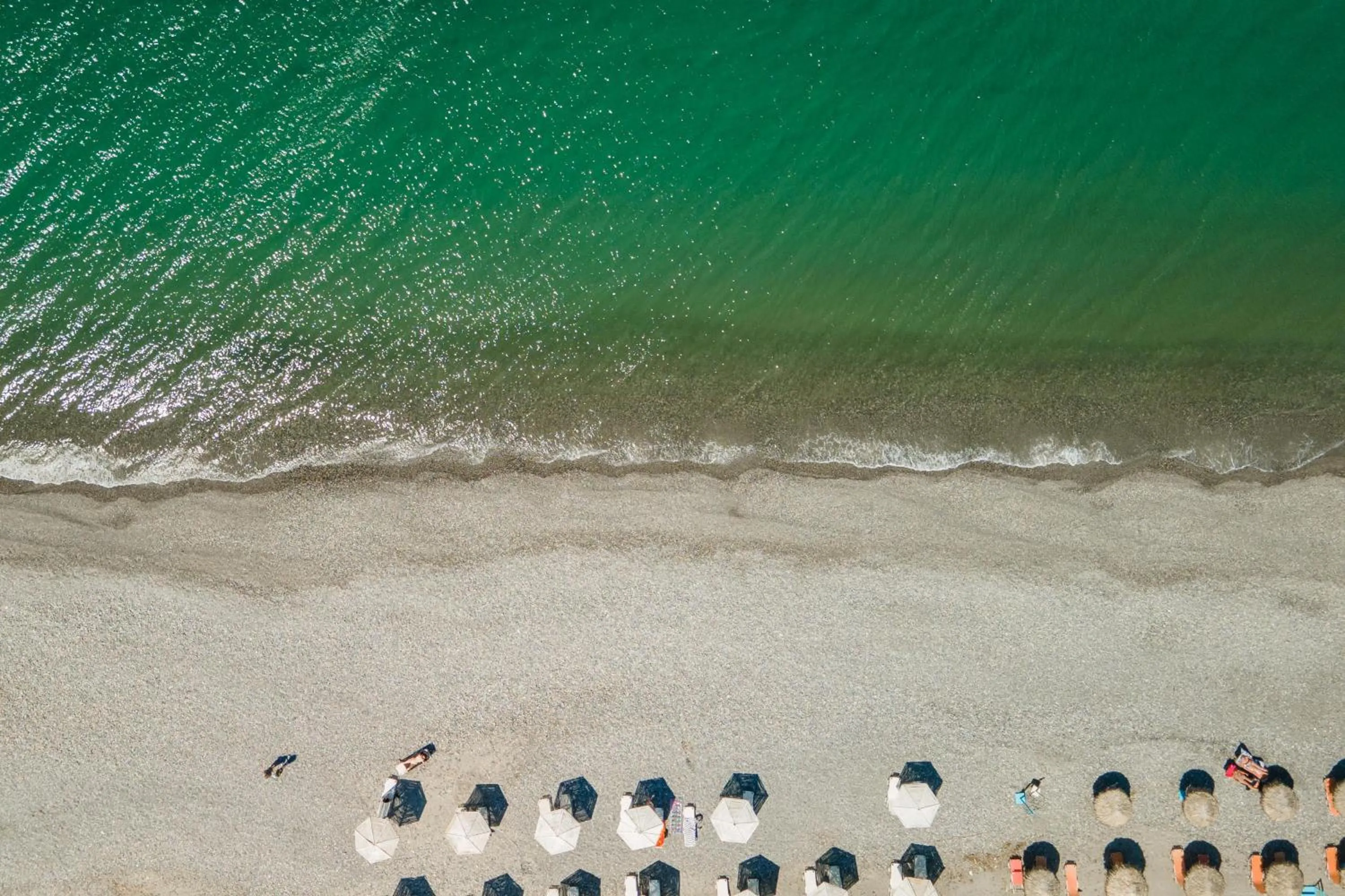 Beach in Aegean Breeze Luxury Apartments next to the sea