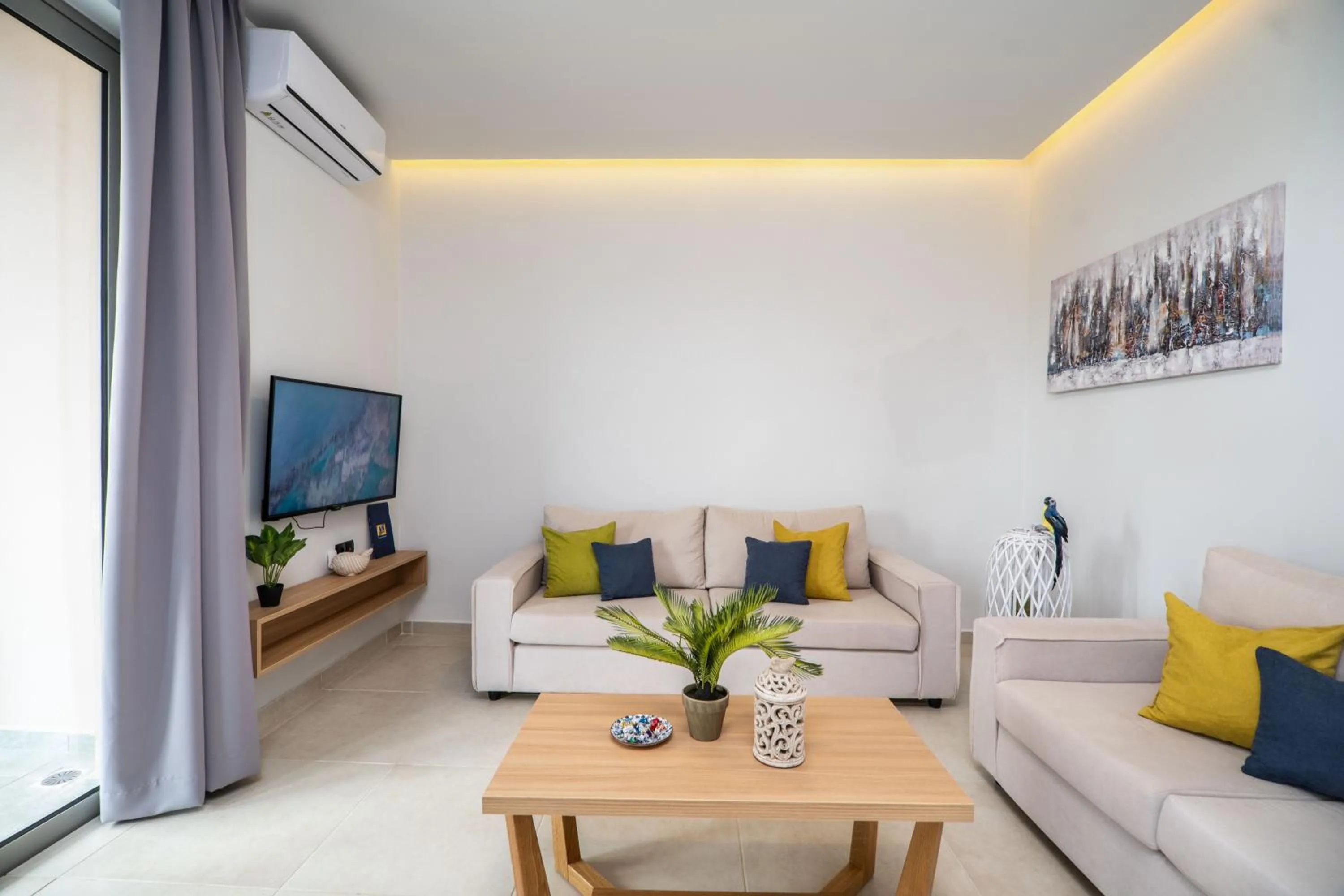 Living room in Aegean Breeze Luxury Apartments next to the sea