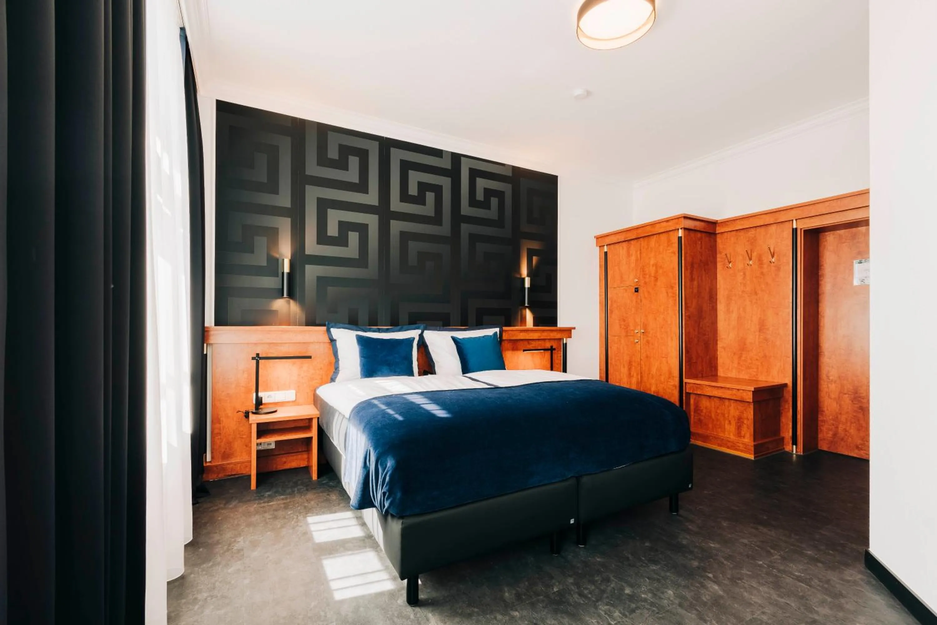 Photo of the whole room, Bed in DAS v EVERT Hotel - am Congress Centrum Würzburg