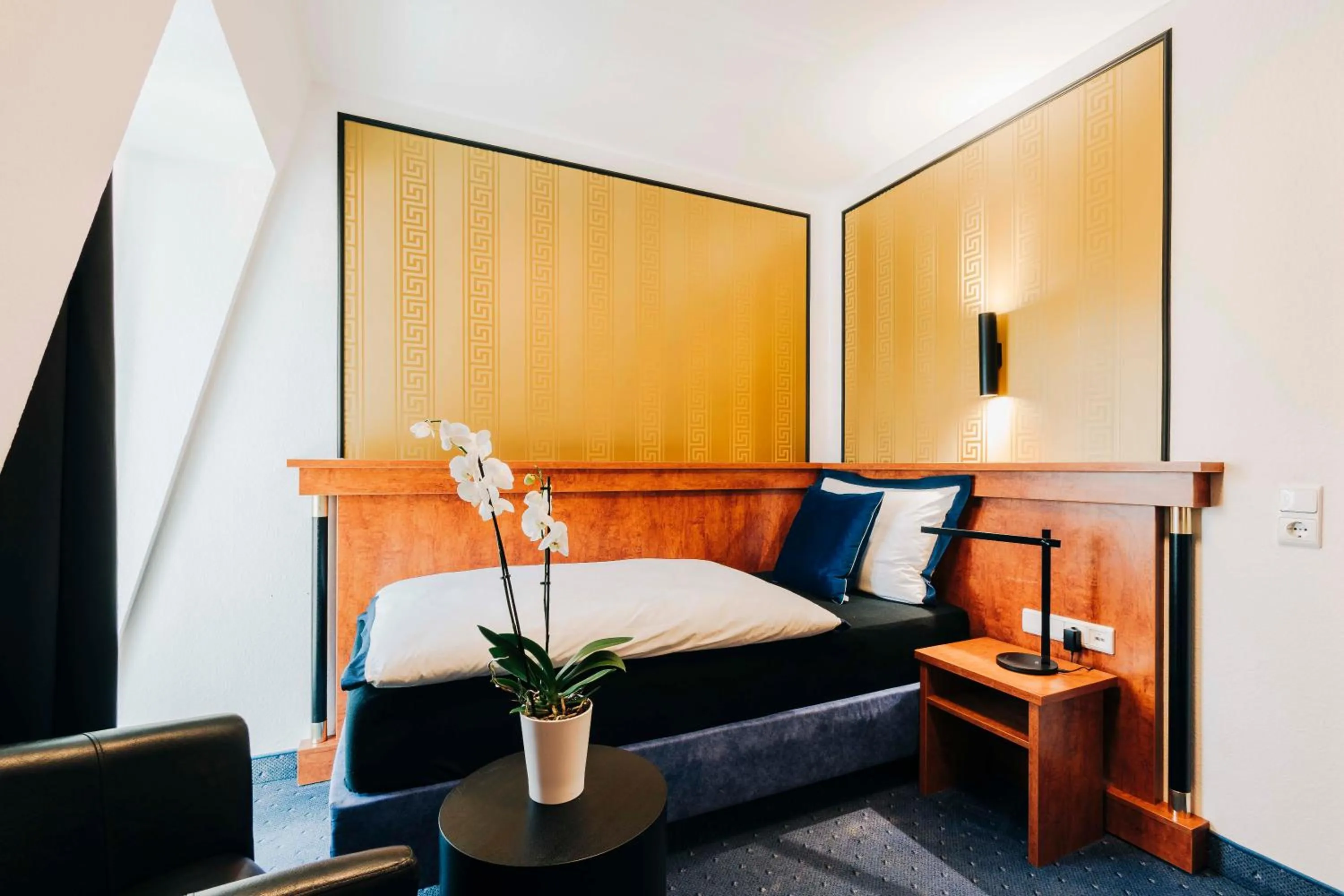 Photo of the whole room, Bed in DAS v EVERT Hotel - am Congress Centrum Würzburg