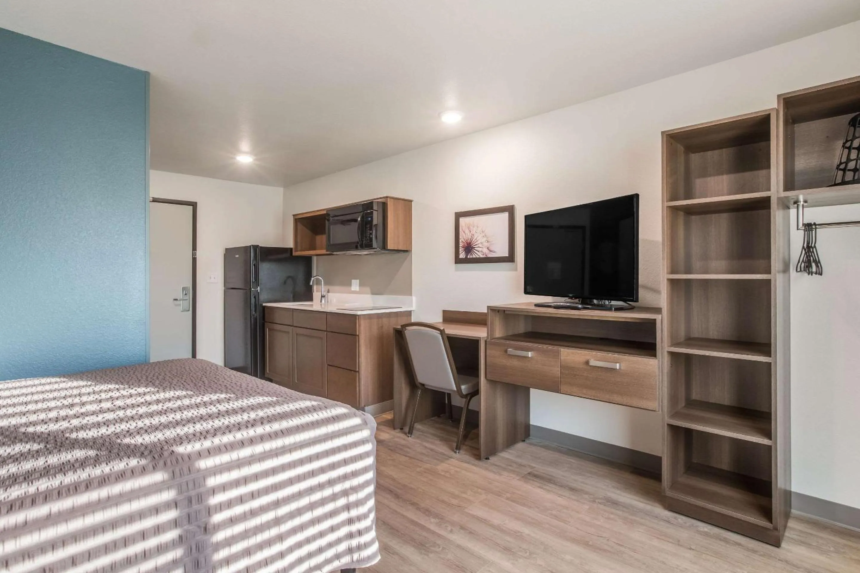 Photo of the whole room in WoodSpring Suites Atlanta McDonough