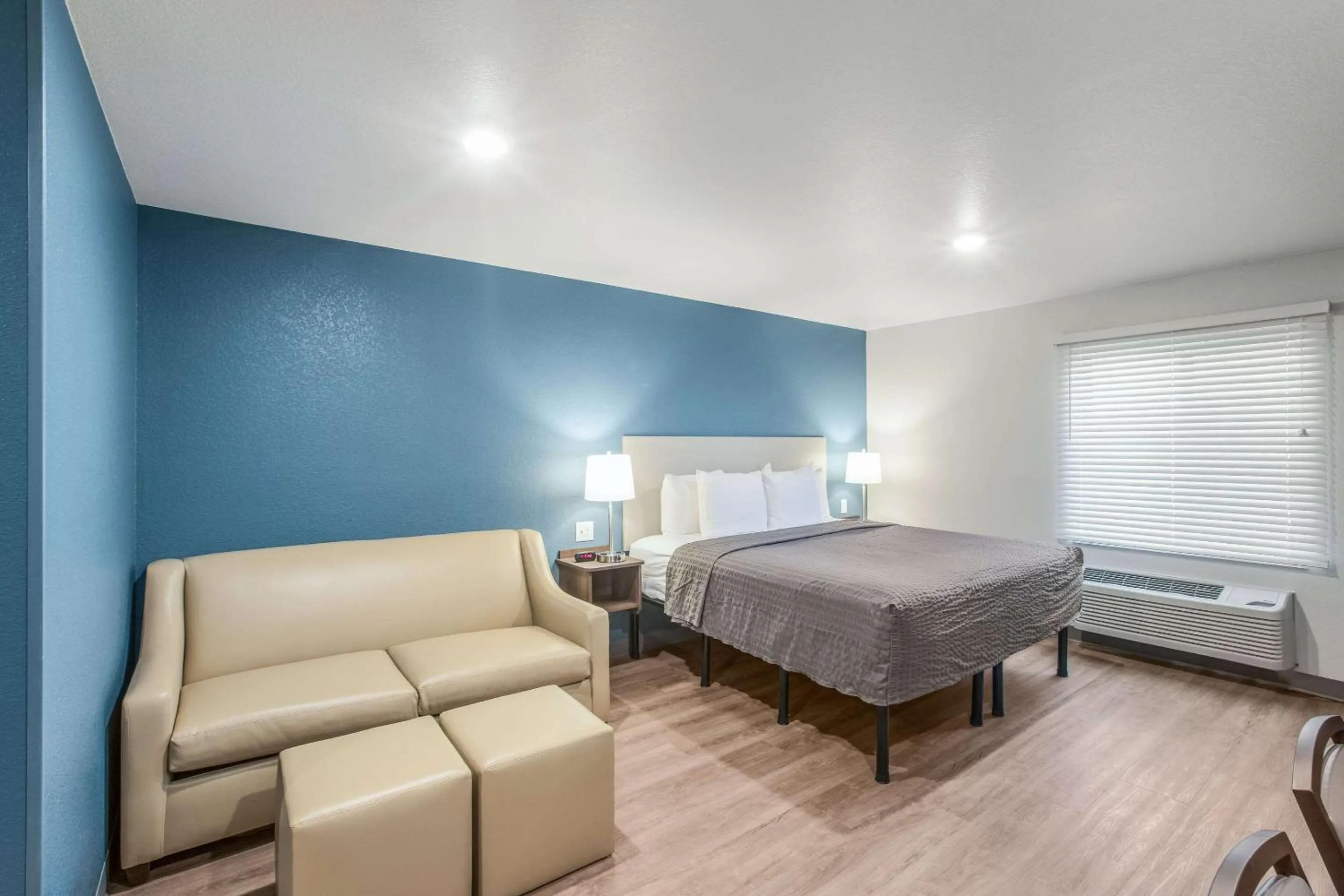Photo of the whole room, Bed in WoodSpring Suites Atlanta McDonough