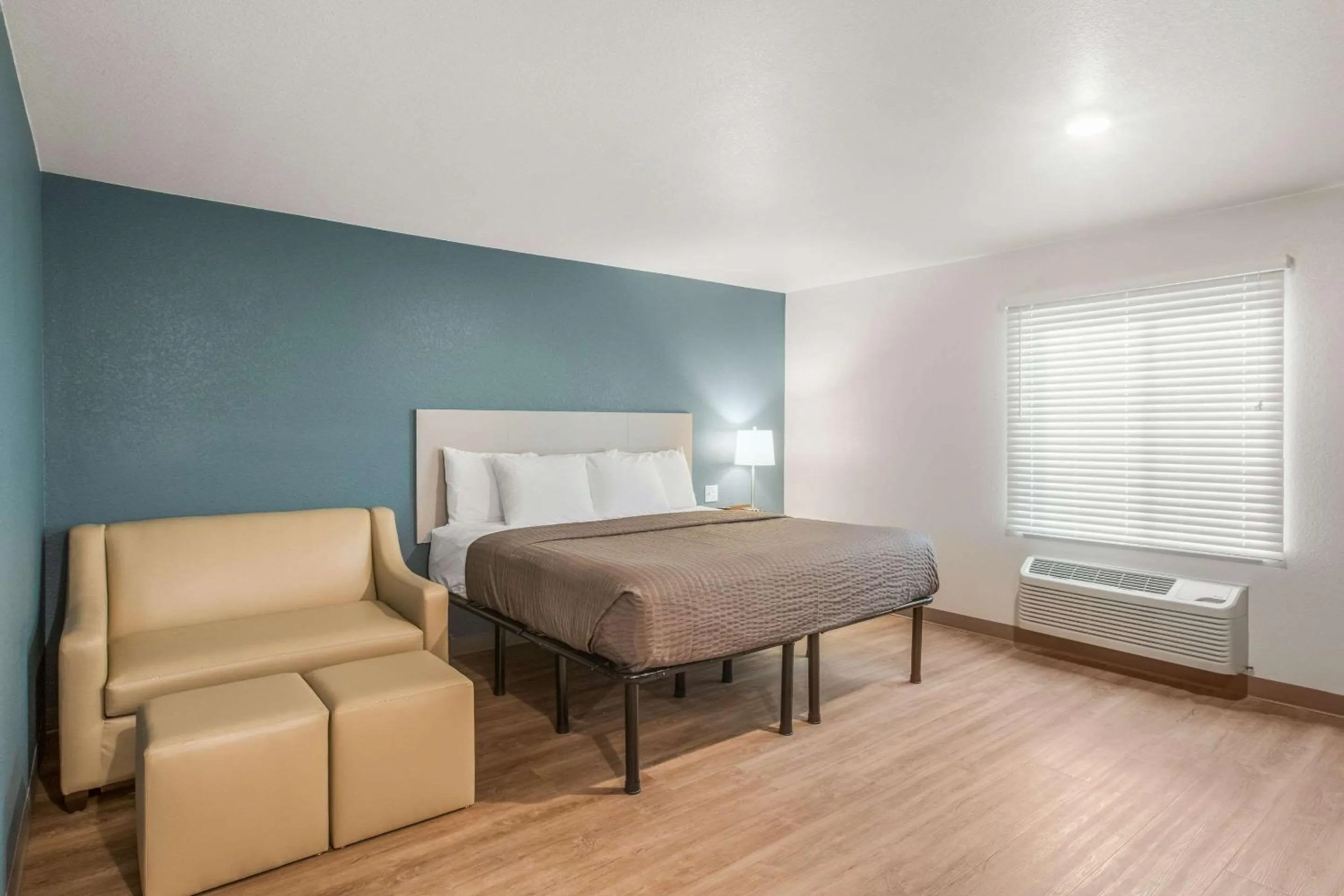 Photo of the whole room, Bed in WoodSpring Suites Atlanta McDonough
