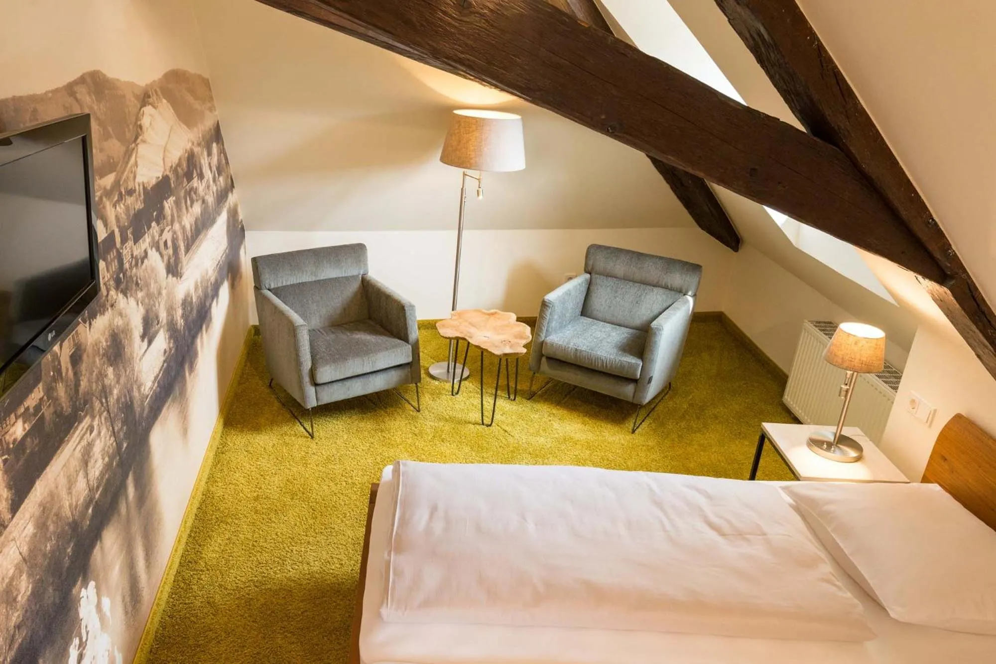 Living room, Bed in Hotel Deutschherrenhof