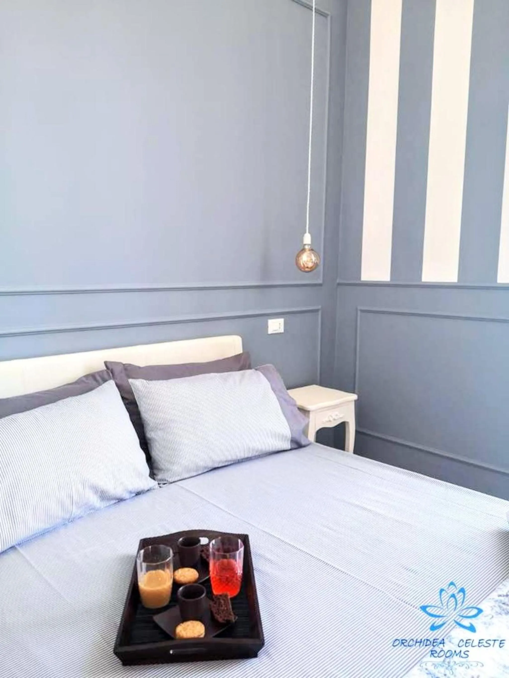 Bed in B&B Orchidea Celeste